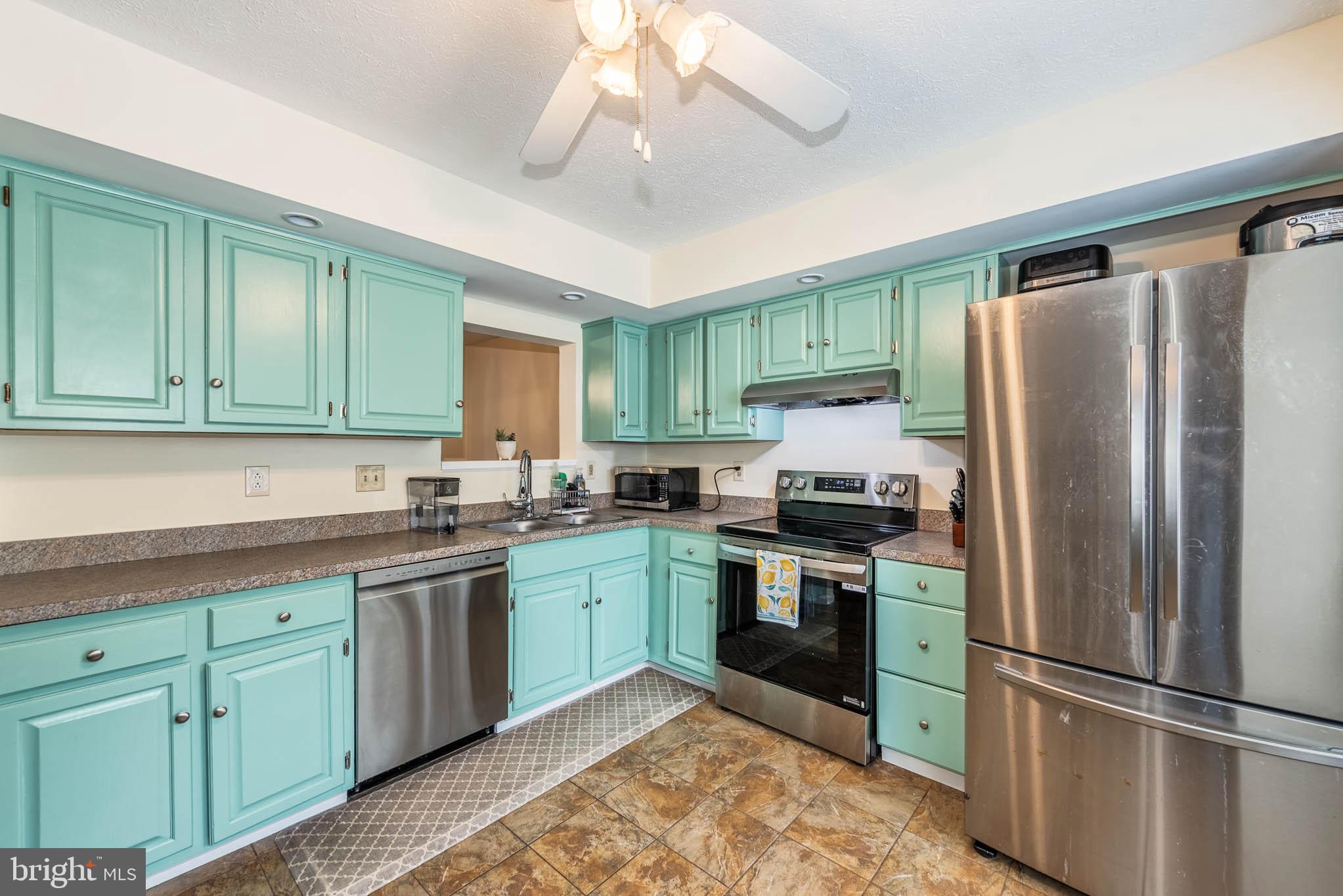 307 SLOPING WOODS COURT