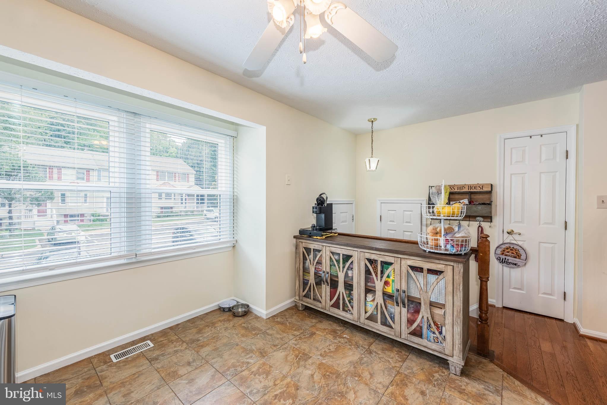 307 SLOPING WOODS COURT
