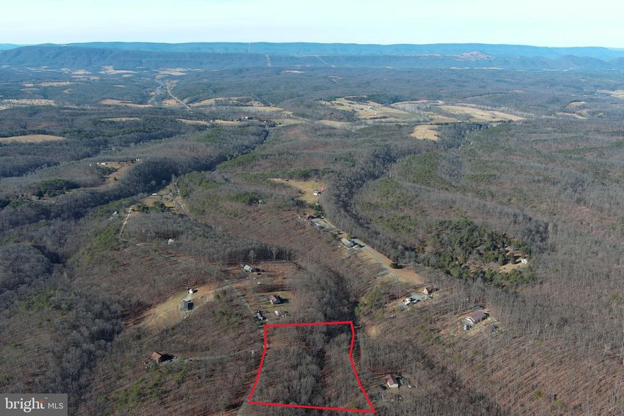 NICE.....NICE TREES, NICE TOPO, NICE LOCATION, NICE PRICE. 4.66 AC BUILDING LOT IN THE FRANKFORT DISTRICT OF MINERAL COUNTY, WHERE IT'S SUPER HARD TO FIND LOTS THIS SIZE. COVERED IN MATURE HARDWOODS WITH A LEVEL RIDGE TOP BUILDING SITE, MINIMAL INFRASTRUCTURE COSTS TO GET THIS ONE FUNCTION...SHORT DRIVEWAY & SHORT PULL FOR ELECTRIC.....IT'S NOT GONNA BREAK THE BANK TO GET THIS ONE READY TO BUILD ON. SHALLOW HOLLOW WITH WET WEATHER STREAM PROVIDES THE PERFECT SPOT FOR A POND. NO MOBILE HOMES OR TINY HOMES ALLOWED BUT YOU CAN CAMP ON THE LOT FROM MARCH - DECEMBER. CONVENIENTLY LOCATED BETWEEN KEYSER AND FORT ASHBY, GET THAT WAY OUT THERE FELLING WITHOUT BEING TOO FAR OUT. IN TODAY'S MARKET, NEARLY 5 ACRES OF BEAUTIFUL WOODLAND FOR ONLY 35K IS A PRETTY SWEET DEAL!
