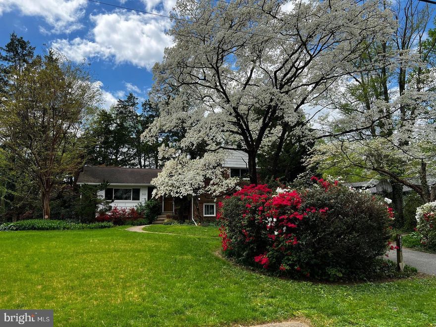 Wonderful open and big home! Glowing with comfort and boasting numerous rooms. This bright and airy 4-bedroom, 4-bath home features an updated kitchen, a living room with a fireplace, a dining room, a family room, a full basement, a gym, a yoga room, a workspace, a main bedroom with an en-suite bathroom, and ample storage space. PLUS a half acre on a very pretty street, a deck to enjoy, a path close by that leads to school, and a great yard to relax and enjoy nature. Easy commute to DC and Tysons and close to shopping!