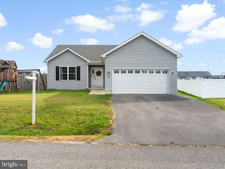 Welcome home to this sleek and modern ranch-style home, offering all the benefits of one-level living without sacrificing space or comfort. Built just 5 years ago in 2020, this thoughtfully designed home features a split owner’s suite for privacy and two additional spacious bedrooms, ideal for family, guests, or a home office. Step inside to find luxury vinyl plank flooring flowing throughout the main living areas, enhancing the home’s open concept design. The bright and airy living room seamlessly connects to the kitchen and dining area, creating the perfect setting for entertaining or everyday living.

Located just minutes from the Dry Run Rd exit off I-81, you’ll enjoy convenient access to Berkeley Medical Center, Hedgesville Schools, shopping, dining, and commuter routes to both Maryland and Virginia.

Outside, the fenced backyard offers privacy and a safe space for pets or play, while the home’s located on at a cul-de-sac street ensuring less through traffic, you also get gorgeous views from being tucked in the valley. 

This home combines modern style, smart design, and an unbeatable location, everything you’ve been searching for! Schedule your showing today!