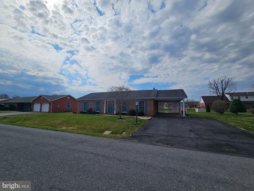 All brick "easy to maintain" rancher on level lot in South Pointe subdivision. Living room with gas fireplace.  Owners suite with full bath, 2 additional bedrooms and 1 full bath.  Main level laundry. Carport and rear patio, shed conveys.  Roof is under 10 yrs old and water heater was replaced in 2024.  Full unfinished basement.