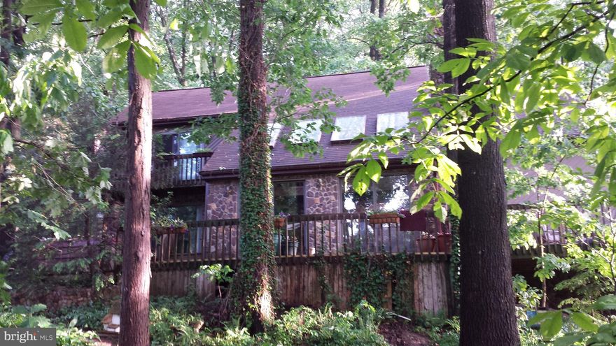 LISTING AGENT, MICHAEL GORDON, IS  A CO-OWNER AND A PA LICENSED REAL ESTATE AGENT

RARE OPPORTUNITY TO LIVE IN A PRIVATE, WOODED LOT, CONTEMPORARY HOME WITH AN INGROUND POOL, POND, ROLLING HILLS, SURRROUNDED BY NATURE