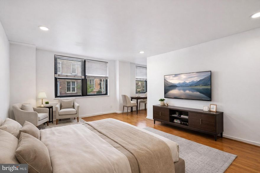 This beautifully upgraded studio condominium at 2601 Parkway is not to be missed! The living and dining area are well proportioned and boast newer oak wood flooring and oversized windows that fill the home with natural light. The kitchen has been thoughtfully renovated and features raised-panel wood cabinetry, a marble countertop, stainless steel appliances with a gas range, and updated fixtures. The bathroom showcases modern tile flooring and wall tile, along with a newer bathtub, toilet, and sink with storage vanity. A spacious walk-in closet with updated flooring, convenient in-unit washer and dryer, new custom interior doors, updated ceiling wiring, and a recently installed hot water heater (2026) complete this move-in ready residence. Condo fees include gas cooking, water and sewer, a convenient shuttle service, state-of-the-art fitness center, and a 24-hour lobby attendant. Located across from the Art Museum and Fairmount Park, this pet-friendly residence is just steps from the scenic Schuylkill River trail for walking and cycling, Kelly Drive, Boathouse Row, Whole Foods Market, the Barnes, and some of the city’s best dining and transportation options.