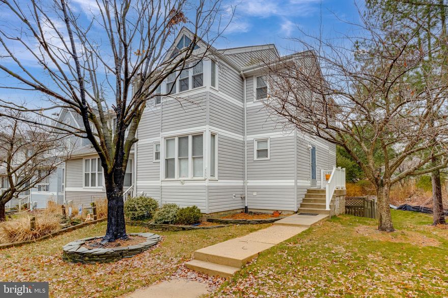 Discover this end-of-group townhouse with 4 spacious bedrooms, 3.5 baths, and a series of practical upgrades. The interior features cherry hardwood floors, new carpet, and fresh paint. The kitchen is equipped with stainless appliances, granite counters, and ample storage, including a breakfast bar and eat-in area. Additional amenities include a large laundry room with extra storage, a tankless water heater for endless hot water, and connections for FIOS or cable internet.

Exterior updates include a new roof with architectural shingles, vinyl siding, and two assigned parking spaces, plus guest parking. Enjoy the community pool, common areas, and the privacy of a backyard that backs to open space and trees. The property also includes a storage shed and a fully finished walk-out basement with a wood-burning fireplace.