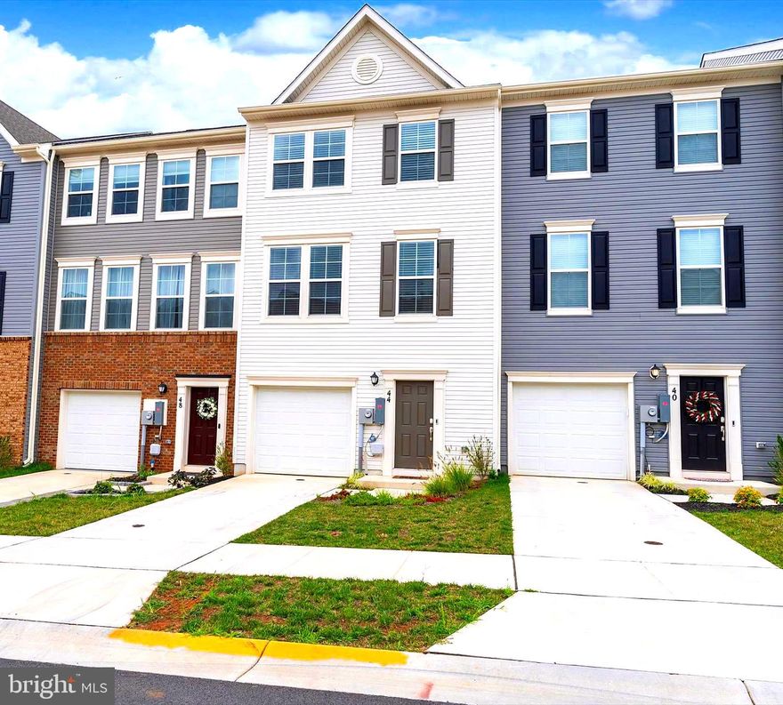 Lancaster Model! Move-in Ready!! Ideally situated interior townhome! Three bedrooms, Two full bathrooms and Two half bathrooms. Extra Large Kitchen Island with Upgraded Granite! Stainless Steel Appliances! 10 X18 Deck off of Kitchen. Fully finished home with basement/rec room - walkout door. Upgraded lighting and ceiling fans throughout! Laundry located on upper bedroom floor. Washer and Dryer included!