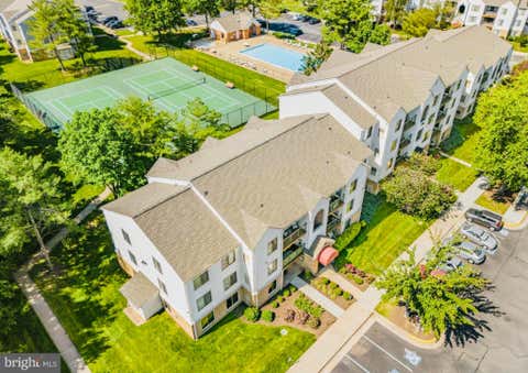 Photo of 8372 Buttress Lane #202, MANASSAS, VA 20110 (MLS # VAMN2011708)