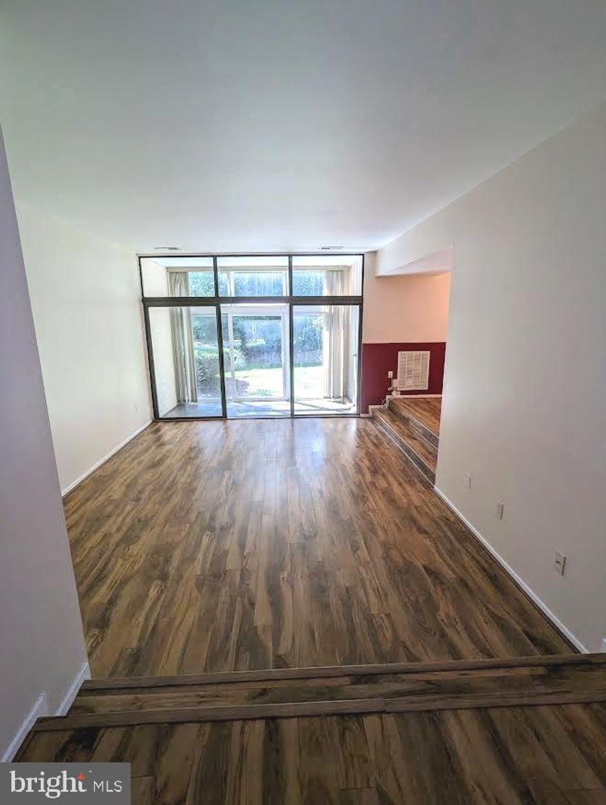 Discover this beautifully updated condo in a prime location less than ten minutes from Lake Anne and Reston Town Center. This home offers spacious, light-filled rooms that create a warm and inviting atmosphere. The large living areas and cozy sunroom provide plenty of space to relax or entertain. The condo will be freshly painted in a neutral color this weekend, making it ready for you to move in and add your personal touch. With the added convenience of an in-unit washer and dryer, this home has everything you need. Don’t miss out on this ideal opportunity—schedule a viewing today!