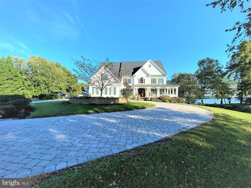 Welcome to Maryland's Eastern Shore and your dream waterfront home or weekend getaway.   Situated  on 2.29  acres with sweeping views of the Wye River, this property offers over 7400 square feet of living space.  Ten foot ceilings, paneled doors, two staircases, windows galore, extensive molding and trimwork, three car garages, two story family room and an impressive foyer with large chandelier that can be lowered.  Six/seven bedrooms, six baths, screen-in porch and a kitchen ideal for Chef's of all ages.  Large pantry, a mudroom with lots of storage and three built-in desks, separate dining room and library/office that allows for many to work out of the home. The main level offers a large bedroom with walk-in closet and full bath, plus a half bath.  The lower level features a large living room with wood fireplace,  engineered floors,  built-in cabinets, bar, area for movie theater and a pool table and a large gym.  The lower level also features a large guestroom with waterviews and an additional bedroom or storage room.  Lots of closet space and storage.  This home is ideal for entertaining large groups with a 20 by 20 gazebo, a 20 by 40 swimming pool, large waterfront yard and a private pier with deep water - ideal for boating, crabbing, fishing, swimming or just chilling. All this is located fifteen minutes to the Chesapeake Bay Bridge and close to restaurants, shopping and just a short trip to Annapolis, Baltimore, DC or Delaware.