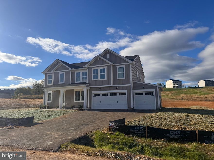 Don’t wait to build—this beautifully designed home is ready for you to move in this November! Take advantage of closing cost assistance when you use our preferred lender. This beautiful home sits on over 1.7 acres, offering the perfect blend of comfort, space, and serenity.  Inside, you'll find generous living areas, a well-appointed kitchen, and flexible rooms for work or play. The expansive lot provides room to roam, garden, entertain, or simply enjoy peaceful country living—just minutes from town conveniences and commuter routes. This 3-car garage, 5-bedroom, 3 bath home on slab blends timeless Farmhouse interior design with modern convenience! ADDITIONAL FEATURES:  Gourmet Kitchen with Hood Vent, Stainless Steel Appliances with range, wall oven, and built in microwave, Gas Fireplace in the Family Room, Main Level Bedroom with full Bath, Tray Ceiling in the Primary Bedroom and Luxury Primary Bath complete with a frameless shower door and free-standing soaking tub.  Enjoy thoughtfully crafted living spaces, modern finishes, and all the benefits of owning a brand-new home without the wait. Schedule your tour today and make this home yours!    Ask about our closing cost assistance with the use of K Hovnanian American Mortgage! **Some photos of similar home.  Pricing and promotions subject to change without notice. See Sales Consultant for more information**