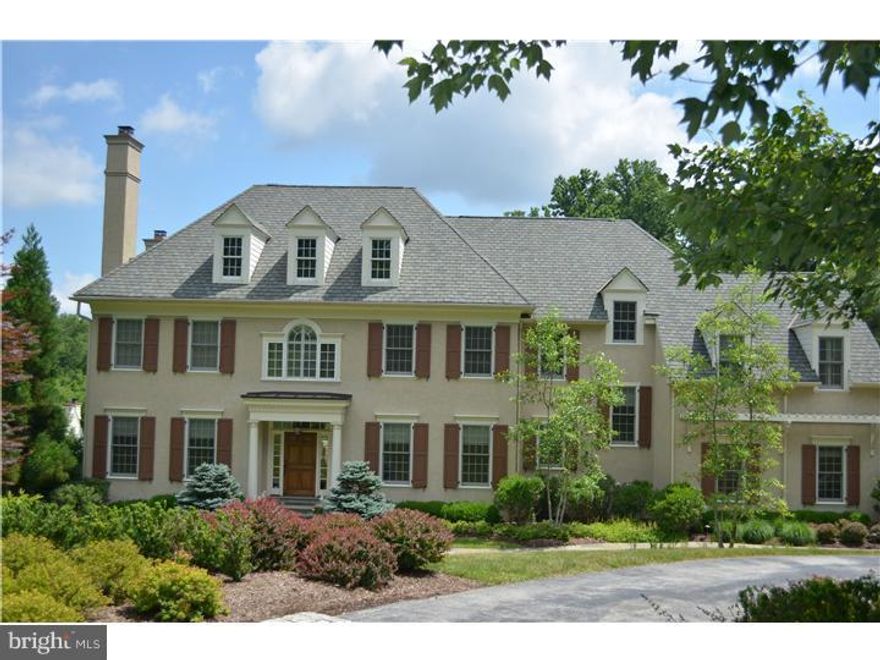 Mill View nestled within the 170 acre Water Mill preserve, this 8 year old custom home offers timeless and well selected interior appointments in the classic and much desired Center Foyer floor plan.  Enter to dramatic nine foot ceilings, gleaming hardwood floors, and beyond to a full wall of glass encouraging views of the private rear yard with French door access to a wraparound teak Deck.  To the right of Foyer is an elegant Dining Room with chair rail, deep base and crown molding and seamless transition to a fully outfitted Butler's Pantry offering wine refrigeration, bar sink, granite counters, and overhead display cabinetry ideal for fine glass and chinaware storage.  A spacious formal Living Room sits to the left of Foyer providing the warm elegance of a limestone mantle and gas burning fireplace.  Custom cabinetry, ideal for display or book storage as well as a fitted cabinet for hideaway television storage is found in the Den/Library.   A mullioned door to the deck from this space facilitates connection to and from the formal and informal spaces.  The heart of the home is found in the Kitchen, adjacent Breakfast and Family rooms.  Large work and seated granite topped island is detailed with a glazed painted finish, handsome paneled insets and strong column supports.  Honey toned cabinetry provides generous storage and granite counters allow for multi-person prep space. A neutral stone backsplash ties the design components together creating a functional and beautiful kitchen.  Steps away is the breakfast room with vaulted ceiling and two full walls of transomed windows which bathe this room In natural light and allow for full appreciation of the private grounds.  The Family Room is highlighted by a coffered ceiling, wood burning fireplace and hidden surround speakers. Tucked away from sight is the homes command center.  Ascend the turned stair to a second level landing with oversized window.  Through double door access find a deluxe Master Bedroom suite with Sitting Room, hardwood floors his and her fully out-fitted  closets and separate marble Baths with shared  double doored glass shower.  Four additional generously sized Bedrooms are found on this level two with en suite Baths and two which share a Jack and Jill Bath.  Fully finished Lower Level offers walk out to grade family area, full bath and exceptional primary storage.  Elegant, well designed and beautifully maintained.