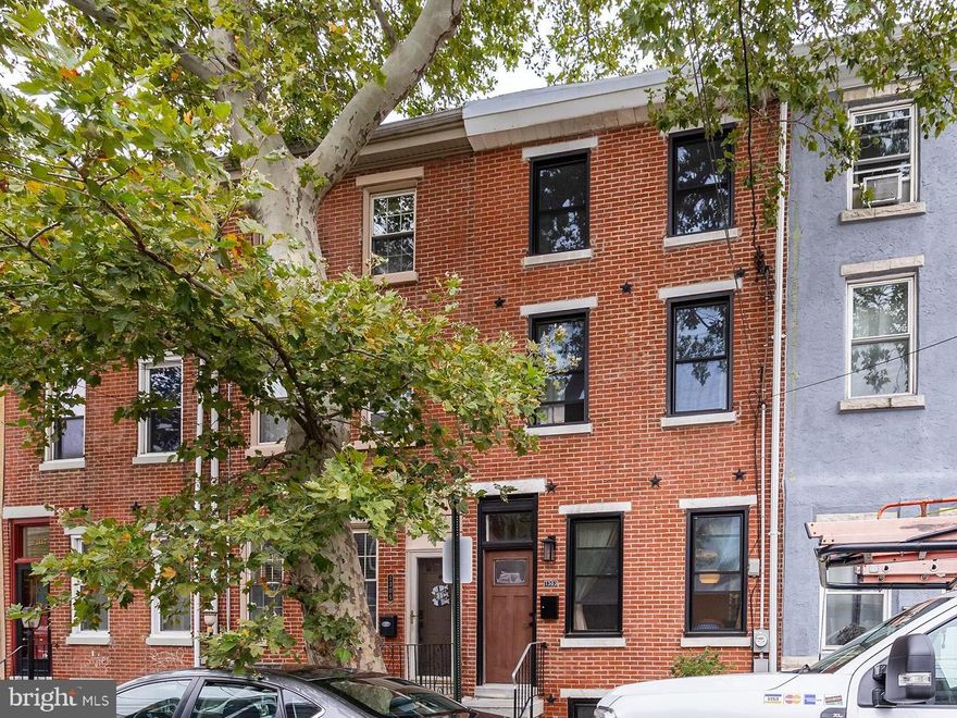 Welcome to the heart of Fishtown! This beautiful brick-faced row home is the perfect place for you to settle in and make your own. Step into the inviting foyer and immediately notice the bright and airy open floor plan that seamlessly connects the living room, dining room, and refreshed kitchen, all drenched in natural light.
On the second floor, you’ll find two bedrooms and a spacious full bathroom, offering comfort and convenience. But the true highlight of this home is the third floor, where the primary suite awaits. Enjoy the luxury of a walk-in closet and a stunning primary bathroom, creating your private oasis.
The basement has been thoughtfully updated with new vinyl flooring, fresh paint, and a convenient half bath and laundry area, making it a versatile space for your needs. This Fishtown gem is ready to welcome you home!