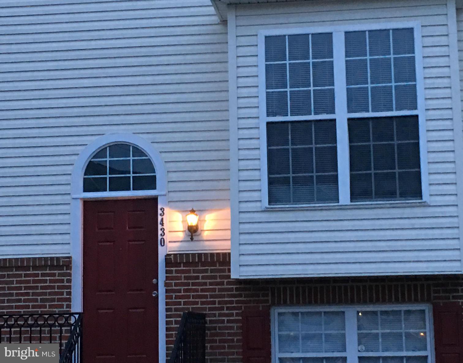 3430 Brahms Drive is a beautifully renovated 4-bedroom, 3.5-bath townhouse in the heart of Woodbridge. This home has been freshly updated with paint on all three levels, new waterproof laminate flooring, and a fully upgraded kitchen featuring new silver appliances, including a refrigerator, microwave, and stove. The bright, open floor plan boasts a two-sided fireplace connecting the living and dining areas, perfect for relaxing or entertaining. Upstairs, you’ll find three spacious bedrooms with new waterproof laminated flooring, including a primary suite with a private bath. The fully finished basement adds a fourth bedroom and full bath, ideal for guests, a home office, or a recreation room. Additional features include ample storage space, a private backyard, and convenient access to Dale Blvd, I-95, Potomac Mills Mall, shopping, and restaurants. This home combines modern updates, comfort, and an unbeatable location ready for you to move in and enjoy.