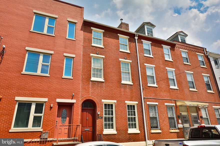 Welcome to this stunning and spacious 6-bedroom, 3-bathroom brick townhome at 1127 Green St, nestled in the heart of Philadelphia's vibrant and historic Spring Garden neighborhood. This remarkable property boasts over 2,600 square feet of living space spread over five levels, providing ample room for all your lifestyle needs.

Meticulously cared for and maintained, this home welcomes you with a warm and inviting living area as you step into the foyer. Beautiful hardwood floors, crown molding, brick fireplace and large windows fill the space with natural light. The main level offers a full bedroom with a large closet and a full bathroom, ideal for use as an in-law suite, home office, or additional living space. There is also convenient access to the private parking spot, located just steps from the back entrance of the home.

The beautiful staircase leads to the second floor featuring a generous sized bedroom with sitting area, ample closet space and a full bathroom with tub. The third floor is devoted to two additional bedrooms with closets. The fourth floor currently is a studio apartment including a kitchen and full bathroom with walk in shower. The fifth floor has two additional bedrooms that are connected by a door.

The basement, recently waterproofed and equipped with a sump pump, is very clean, offers ample storage space, and could easily be finished for additional space. The large basement could easily be converted to a fitness room, theater area, game room or office space. 

One standout feature of this property is its former multi-family zoning that was licensed by the city and  lapsed in 2020, providing potential for future expansion or conversion. There is a studio apartment located on the fourth floor. 

Situated in the 19123 zip code, this home is just a short distance from a wide variety of shops, restaurants, cafes, and nightlife. You'll also find easy access to public transportation, parks, and cultural landmarks, making it an ideal location for both convenience and lifestyle.

This home offers the perfect blend of luxury and convenience in one of Philadelphia's most sought-after neighborhoods. Don't miss this incredible opportunity to own a piece of Philadelphia's history and make it your own!