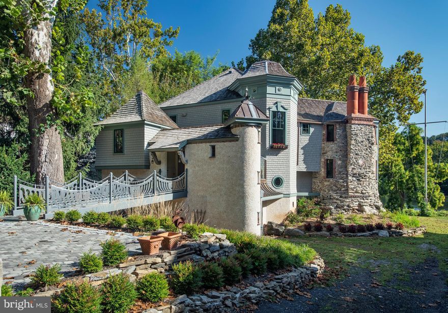 Architect Fred Bissinger's Own River Front Retreat - River Rd.'s historic Ice House location has been transformed by Bissinger in collaboration with Rufo Properties over a period of several years. Cottages and fishing camps have been replaced with stylish and unique, sea worthy modern structures. This most recent project, 252 River Rd. is a personal creation for the architect and has a decidedly Bissinger style. It was designed to create a Nautical Experience and is perfectly sited to capture unobstructed views of the Schuylkill River. From the copper dragon who wraps around the turret to the bronze mermaid anchoring the stairway this home shows off artisan details and is accentuated with artwork and archival architectural antiques at every turn. Traverse the gang plank as if boarding a ship and enter Bissinger's somewhat whimsical yet historical interpretation of modern water-front living in this unique home. Must be experienced in person to appreciate. By appointment only.