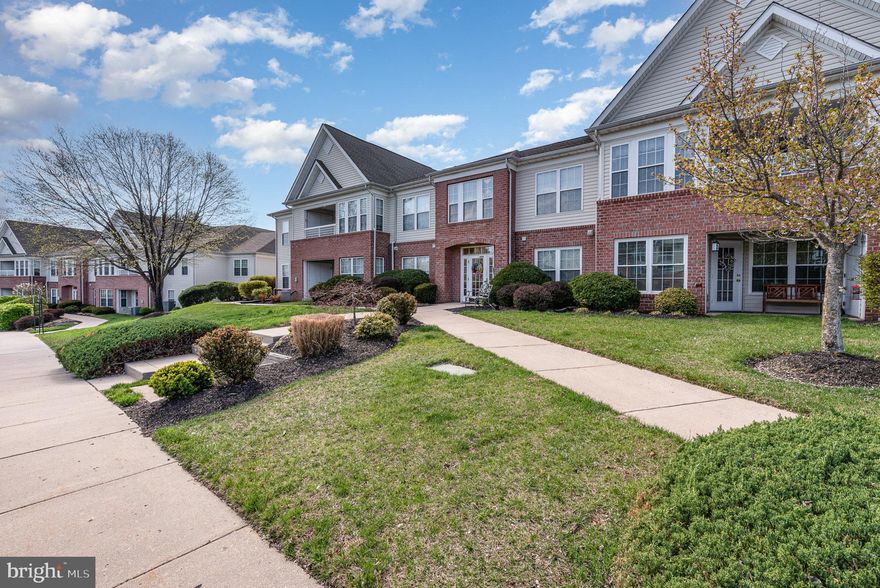 Welcome to carefree condo living in coveted Taylor Ridge! This beautifully updated 2nd-floor corner condo offers one of the largest floor plans in the community! This home is designed for comfort and convenience with 2 spacious bedrooms, a versatile den (perfect as a 3rd bedroom or office), with two full baths (2023).

Step into the foyer with recently installed luxury waterproof (laminate) plank flooring that leads into the airy living and dining area, which is highlighted by soaring vaulted ceilings and also to the kitchen, laundry, den and large storage closet. The gorgeous gourmet kitchen, fully updated in 2023, boasts white semi-custom Kraftmaid cabinetry, quartz countertops, under-cabinet lighting, and stainless-steel appliances (2021) including a bottom drawer freezer refrigerator, gas range with air fryer feature and griddle, microwave, and ultra-quiet dishwasher. A sunlit breakfast room opens to a private balcony overlooking serene green space—perfect for morning coffee or evening relaxation.

The generously sized owner’s suite features a walk-in closet with customizable shelving and a fully remodeled en-suite bath with an oversized shower. The second bedroom is equally roomy; the second bath is also updated with modern tile, new fixtures, and vanity, and the den adds an additional room providing flexible living space. Ample storage in a large bonus closet, a separate laundry room with utility sink and added shelving, and updated HVAC (2023) complete this amazing condo.

Enjoy resort-style amenities including a swimming pool, fitness center, tennis courts, and community clubhouse. Easy living in a vibrant, well-maintained neighborhood with plenty of parking and great curb appeal—this is truly a place to call home!