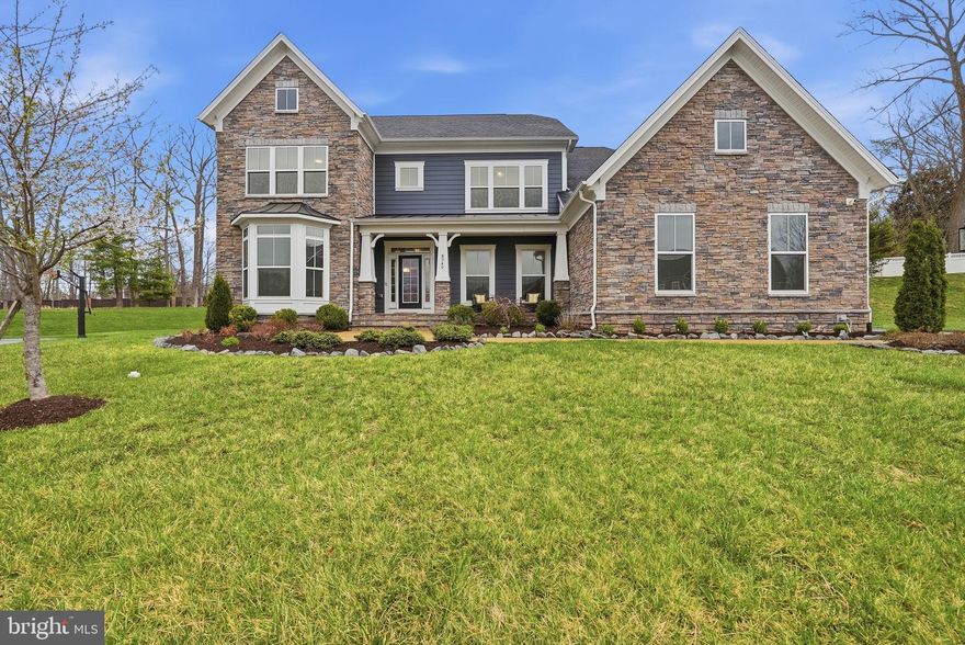 Welcome to 8940 Silvan Woods Ct in Fairfax, where nothing about this home is builder-grade. This exquisitely upgraded 2019 colonial offers 5 bedrooms and 4.5 baths, ideally situated on a quiet cul-de-sac in the highly coveted Mantua community—renowned for its tree-lined streets, strong sense of community, and exceptional Northern Virginia convenience.

Inside, timeless elegance meets modern sophistication. A gracious formal dining room welcomes you upon entry, while a spacious first-floor office with French doors provides a refined and private work-from-home retreat.

At the heart of the home lies a stunning open-concept chef’s kitchen, thoughtfully designed with high-end Electrolux appliances, a sleek downdraft range, custom cabinetry, designer tile, and luxurious quartz countertops. The upgraded butler’s pantry elevates entertaining with a wine refrigerator, second Bosch dishwasher, and an additional walk-in pantry—offering both beauty and functionality.

The light-filled eat-in kitchen flows effortlessly onto a gorgeous deck, creating the perfect setting for al fresco dining. Seamless connectivity between the kitchen, family room, dining area, and outdoor spaces makes this home ideal for both everyday living and elegant entertaining. The expansive family room, anchored by a gas fireplace and custom built-ins offers a warm and inviting gathering space. A stylish powder room and well-appointed mudroom leading to a three-car garage with electric charger complete the main level.

Step outside to a spectacular outdoor retreat, featuring a large deck, patio with fire pit, and an expansive, manicured yard. Enhanced with a sprinkler system and electric fence, this outdoor space is as functional as it is beautiful—perfect for entertaining, play, or peaceful relaxation.

Upstairs, the primary suite is a true sanctuary, showcasing generous walk-in closets with custom built-ins and a spa-inspired en suite bath complete with double vanity, custom storage, soaking tub, and an oversized shower. Two additional bedrooms with custom closets share a beautifully designed Jack-and-Jill bath with double vanity, while a fourth bedroom features its own private en suite. The upper-level laundry room, complete with sink and additional storage, adds everyday convenience. This thoughtfully designed level offers both comfort and flexibility for family and guests alike.

The fully finished lower level is perfectly suited for multigenerational living or extended stays, offering a private in-law suite with a generously sized bedroom and private bath, kitchenette, separate laundry, and a fully equipped home gym.

Built in 2019, the home provides peace of mind with modern systems throughout, including a whole house generator, dual-zone Rheem HVAC and a 75-gallon water heater—delivering years of low-maintenance living.

Located in the highly sought-after Mantua neighborhood, this home offers a rare blend of serene suburban living and exceptional convenience to Washington, DC. Enjoy immediate access to neighborhood walking paths that connect seamlessly to the Cross County Trail system and Eakin Park, perfect for outdoor recreation and everyday escapes into nature.

This premier location is also offers top-rated schools and provides easy access to major commuter routes, making daily travel effortless. With its timeless charm, and strong sense of community, Mantua continues to stand out as one of Fairfax’s most desirable and enduring neighborhoods.

This exceptional residence offers refined finishes, expansive living spaces, and effortless luxury in a premier location.

A rare opportunity not to be missed.