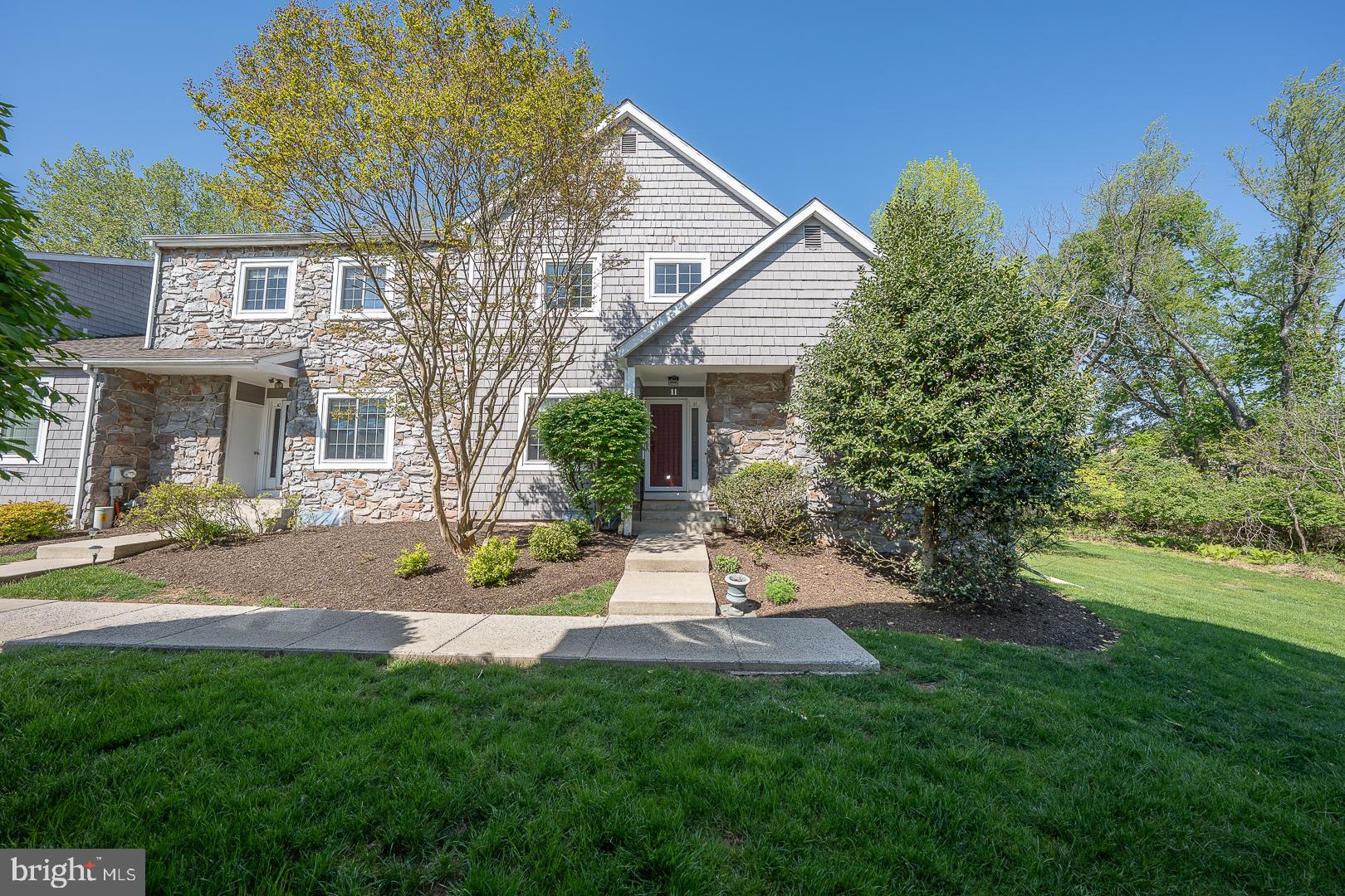 Bright and beautiful 3BR, 2.2 Bath END UNIT with a stunning primary suite on the main level. Come see this meticulously maintained home in the highly-desirable Bradford Hills neighborhood of Chesterbrook. This home boasts an updated kitchen with Schrock custom cabinetry, Baldwin hardware, Carrara marble countertops, Bosch appliances and Kitchen Aid counter-depth refrigerator; hardwood floors; newer windows, skylights, and slider installed by Nelson Bldg. Group (2011/12); gas furnace and A/C installed 2012; primary bath with oversized walk-in shower; updated hall bathroom on 2nd level and new powder room vanity on main level. Deck access from main bedroom and kitchen and in 2024 seller repainted the deck. Other highlights include a fabulous finished basement with fireplace, bonus room currently being used as a bedroom, work space, storage room and laundry area; private, fenced rear garden area; and the second floor boasts 2 additional bedrooms, a full bath and the finished loft space. The home is adjacent to open space, offering peace & quiet and is near a walking path that runs along idyllic Valley Creek. The location provides convenient access to walking/cycling trails, Wilson Farm Park and Valley Forge Park. Very close to major shopping including Wegman's, Trader Joe's, Gateway Shopping Center, King of Prussia Mall, and all major commuter routes. All this, plus the award winning Tredyffrin-Easttown School District. Move in and immediately take advantage of all that Chesterbrook and the Main Line have to offer! Note: Special assessment fee per unit is $41,667.