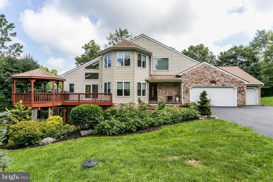 Stunning custom-built home in serene picturesque country setting.  Outside, enjoy professional landscaping, gazebo, waterfall, and extensive front & rear decking. Meticulously maintained interior has incredible natural light on all levels, hardwood, granite, two fireplaces, three car garage, and full basement. Furnace 2015, AC 2014. Generator.  Hereford zone schools just a few minutes from 83.