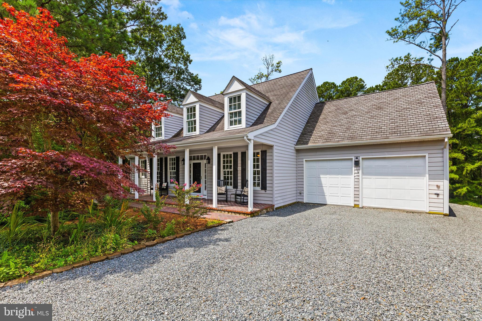 Tucked away in the sought-after amenity-rich community of Ocean Pines, this spacious and serene 5-bedroom, 4-bathroom home offers the perfect blend of comfort, privacy, and functionality—just minutes from the beach! Surrounded by mature trees and backing to a peaceful pond, you'll love coming home to this tranquil escape.
Step inside and be welcomed by a bright office space—ideal for remote work or a quiet study nook. The heart of the home is the open kitchen with heated floors, perfect for cozy mornings, flowing effortlessly into the living area complete with a warm gas fireplace. The main level has 2 bedrooms that also features one of two primary suites, each with a private en-suite bath—ideal for multi-generational living or ultimate guest comfort. Each levels offer 2 full baths.
Upstairs, you’ll find the second primary suite, two additional bedrooms, and a versatile bonus room—great for a media space, playroom, or gym. With two HVAC systems, treated windows, and a tankless water heater, this home was designed with efficiency and comfort in mind.
Enjoy your morning coffee on the beautiful front porch, or unwind out back with tranquil water views and wooded privacy. What truly sets this property apart? Its unbeatable location—just a short walk to the community pools and the Yacht Club!
Ocean Pines offers incredible amenities like pools, golf, a yacht club, parks, and more—making this not just a home, but a lifestyle.