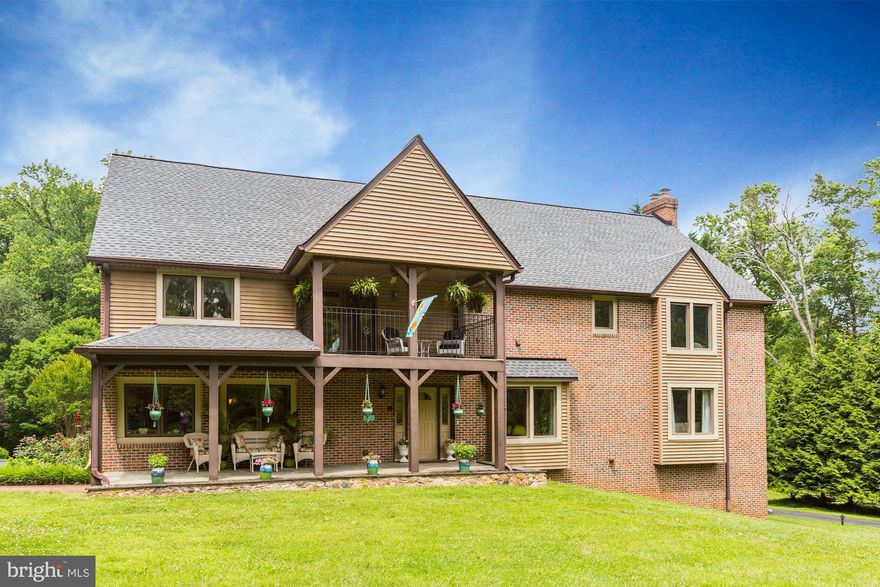 Welcome Home! This spectacular brick estate is situated on over 9.5 acres in Dayton. Greet guests in the inviting foyer with hard wood floors and crown molding. Head into the heart of the home, the kitchen, to find a space to the liking of even the most discerning chef. The kitchen boasts granite counter tops, a large island with breakfast bar, appliance garages built into the cabinetry, and stainless-steel appliances, including a six-burner gas stove/double oven, professional-level refrigerator, dishwasher, and built-in microwave. Enjoy casual meals in the breakfast room adjacent to the kitchen. Thanks to all of the windows, the breakfast room and kitchen are flooded with natural light. Enjoy larger, or more formal meals, in the formal dining room, complete with hard wood floors, chair rails, and crown molding. Spend evenings relaxing by the wood stove in the spacious family room featuring a ceiling fan and box window. Host guests in the formal living room with hard wood floors and a box window. A bonus room on the main level could be used as an office, game room, or whatever else you could imagine. The grand, two-story sun room with hard wood floors, wood stove, and nearly floor-to-ceiling windows overlooks the back yard and swimming pool. The spiral staircase in the sun room leads you to the loft on the second level of the home. A half bathroom with hard wood floors and custom wainscoting completes the main level. Retire at the end of a long day to the master bedroom suite featuring a cathedral ceiling, ceiling fan, transom windows, two walk-in closets-one with a built-in vanity and mirror, a private sitting room, and a French door to a private balcony. In the en-suite master bathroom, enjoy the jetted soaking tub, separate shower enclosure, and dual sinks. The loft overlooking the sunroom and swimming pool makes for another great gathering space for family or friends. Four additional, spacious bedrooms, another full bathroom with dual sinks, and a bedroom-level laundry room round out the second level of the home.Head down the lighted stairs to the lower level where you will find a sixth bedroom with a wood stove and walk-in closet. Make use of the exercise room that looks out on the swimming pool. A third full bathroom and tons of unfinished space, offering limitless potential, completes the lower level of the home. The lower level is walk-out level, providing direct access to the private, in-ground swimming pool with a stamped concrete patio surround. Spend warm evenings in the screened in gazebo featuring plumbing and electricity. And grill meals at the outdoor, built-in grill/kitchen area. It s like having your own private oasis. This gorgeous home has everything you have been looking for and then some. It is a must see!!