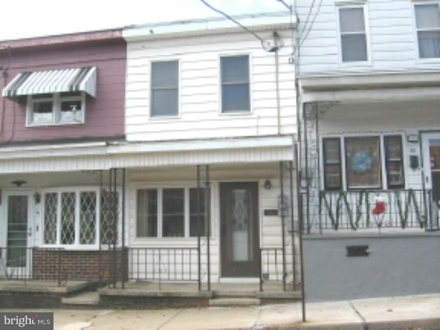 Greater starter deal,2 story row home.Vinyl sided,concrete front porch.Double pane windows thru-out. Electric heat.1st flr Laundry H/U. Modern Bath w/12ft closet.Ceramic tile tub area.Rubber roof.Livable condition,in need of updates.Property sold as is condition.Cash purchase only.