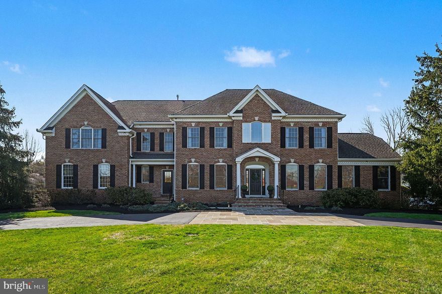 Welcome to this stately Colonial home set on a beautifully maintained lot just minutes from downtown Skippack. Meticulously maintained and thoughtfully upgraded, this home offers a seamless blend of comfort and functionality, with no detail overlooked by the current owners.

A grand two-story foyer featuring an elegant curved staircase welcomes you into a well-designed main level with a formal dining room, private home office, wet bar area, and multiple living spaces ideal for gatherings.
The gourmet kitchen serves as the heart of the home, showcasing an oversized island with seating, upgraded appliances, abundant cabinetry, and a bright breakfast area.

Additional main level highlights include a spacious family room with fireplace and skylights, along with a cozy sitting room. 

Upstairs, the primary suite offers a private retreat with a double-sided fireplace, sitting area, ensuite bath with double vanity, and generous closet space.

Three additional bedrooms include their own ensuite bathrooms, while a fifth bedroom provides flexibility for guests or additional living space. 

The finished daylight lower level expands the entertaining space with a bar area, bonus room, full bath, and dedicated home gym.

Step outside to enjoy the stunning inground pool, complemented by a well-appointed pool house that offers additional space for entertaining or unwinding.  Additional features include a 3-car garage and a convenient location within the award winning Souderton School District, just minutes from major roadways, shopping, dining, and local parks.