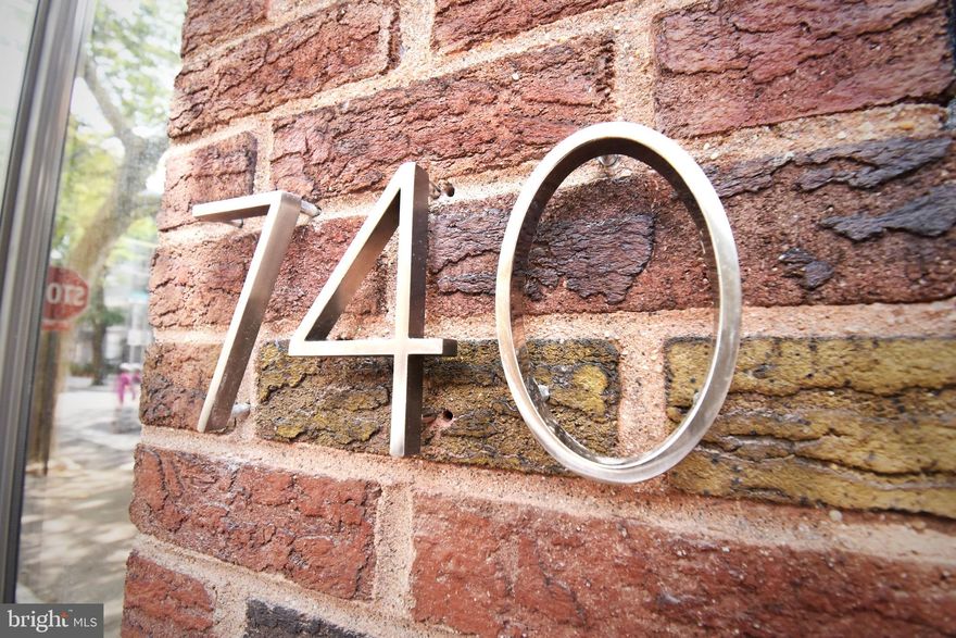 Welcome Home!! This Bella Vista beauty boasts three spacious bedrooms, one and a half designer bathrooms,  central air conditioning,  gleaming hardwood floors throughout, a spacious open concept floor plan, and unusually high ceilings. During the day this handsome abode is filled with an abundance of  natural lighting. The spacious living area leads into a separate dining nook followed by a chef's kitchen with ample cabinet space, a breakfast bar, all new stainless steel appliances and a funky glass subway tile back splash. There is also an outer entrance in the kitchen to a quaint back yard, perfect for grilling and a morning coffee. A convenient powder room with new fixtures closes out the first floor. Up the fancy rounded steps, on the second floor, you'll find two sizable bedrooms, along with a full ceramic tile four piece bathroom featuring a multi person Jacuzzi tub, as well as a large tiled stall shower. On the third floor, you'll find a large lofted master bedroom. The basement houses all utilities, and storage, with it's own Bilko entrance. With one of the best locations in Philadelphia,  this home is both charming and convenient. It is not a trinity, even though it is priced that way! Check out the pictures, they do not lie! You can walk to Pennsylvania Hospital, Washington Square Park, Center City, and easily navigate the city with public transportation. As a Bella Vista resident, you'll enjoy all the shops,restaurants and galleries that the neighborhood has to offer. Don't miss your opportunity. Schedule a showing today! This home is professionally staged and shows like a model!