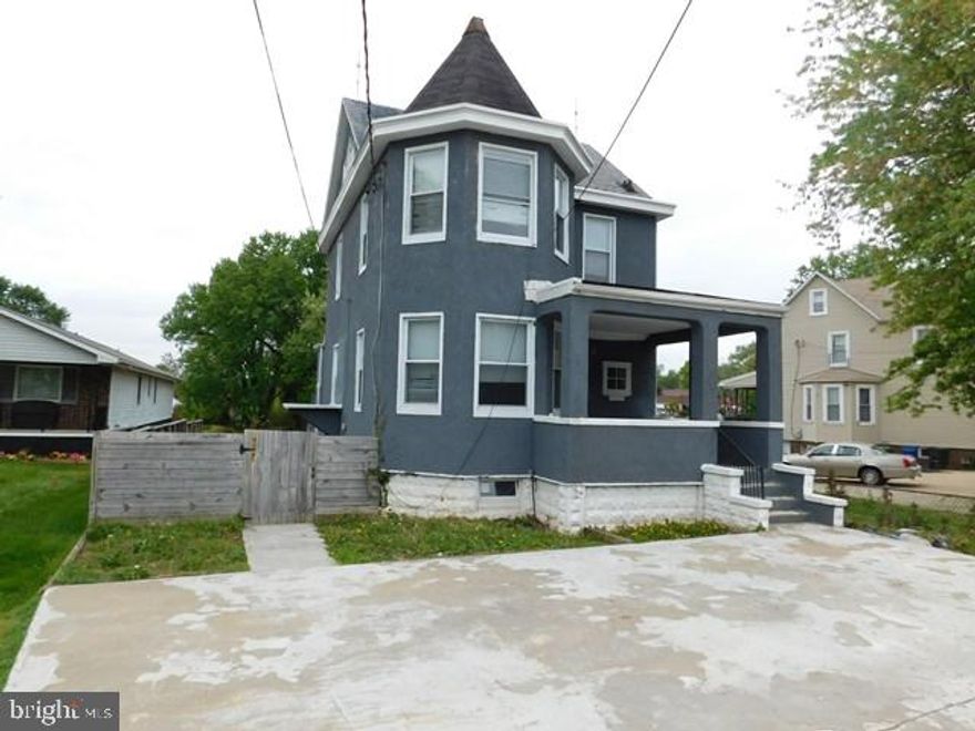 This spacious 3 bedroom, 3.5 bath Victorian home features 4 finished levels of living space. A charming front porch with a stained glass front door with glass storm door, concrete driveway with off street parking and large deck with steps to the fenced back yard create outdoor appeal. Inside, lots of updates have been done, needs some work but features rich hardwood flooring,  a living room area with a graceful bowed wall of windows, kitchen and dining area with French doors that open to the large deck and a powder room on the main level. Hardwood floors continue upstairs where you'll find two light filled bedrooms each with its own private updated bath. The uppermost level feature another spacious bedroom and 3rd full bath. The finished walk-up lower level has a recreation room, laundry room and utility rooms. Situated on a corner lot with off street parking in the quiet Cedonia community.