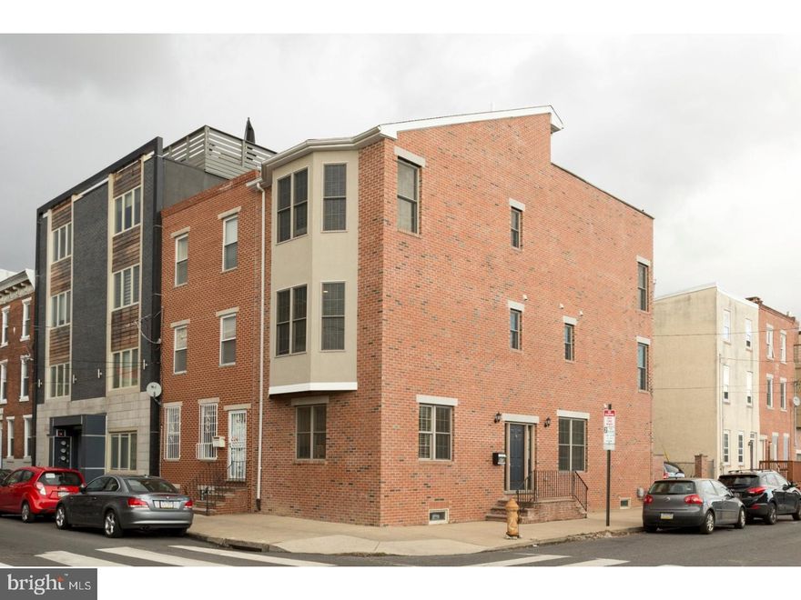 Welcome to 919 S 16th street; a beautiful, oversized, brick town home in Philadelphia's booming Graduate Hospital neighborhood. Park your car in the off street, uncovered spot and enter through the kitchen or front door located on the Carpenter Street side of the property. The first level offers an open concept layout which includes a custom kitchen granite countertops, Travertine backsplash and GE Profile appliances (exception, Bosch dishwasher), living/dining room and powder room. A spacious finished basement finishes off the generous lower levels. Second floor features two of the four bedrooms both with en-suite full bathrooms. The third level hosts the master suite including bathroom with overhead shower and sunken tub, also has additional space for fourth bedroom or living room/office option. Lastly, enjoy the Philadelphia skyline on the large rooftop deck that offers plenty of space for both relaxing and entertaining.919 features Anderson windows, recessed lighting and cherry wood mahogany stained floors throughout. Easy access to Philadelphia's public transportation  as well as all of the great local restaurants, bars and shops.