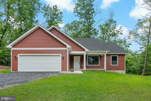 REDUCED*** Move-in Ready! Welcome to this beautiful 3-bedroom, 2-bathroom ranch-style home, nestled on 2 wooded acres in a peaceful neighborhood . This stunning new construction features a welcoming front porch, perfect for relaxing and enjoying the serene surroundings. The open-concept living area boasts luxury vinyl plank (LVP) flooring throughout the main level, providing a modern and low-maintenance feel. The spacious kitchen is equipped with sleek stainless steel appliances and elegant granite countertops, ideal for cooking and entertaining. The primary suite, where you'll find a huge walk-in tile shower in the bathroom. The two additional bedrooms are generously sized and carpeted for comfort. Outside, you'll appreciate the privacy provided by the wooded lot, with some acreage cleared for your outdoor activities. The 2-car garage offers ample space for your vehicles and storage, while the crawl space provides additional room for storage needs. This home is on a well and septic system, adding to its privacy and rural charm, while being surrounded by other beautiful homes in a lovely, spread-out neighborhood. Sidewalk just completed . Don’t miss the opportunity to make this stunning home yours!