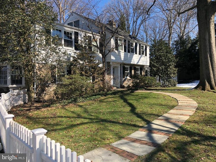 Lovely farm-style home on private driveway surrounded with  park like grounds and mature landscaping. Refurbished for today's living, featuring a  stunning open floor plan, chef's kitchen with oversized  breakfast bar and dining area accented with a fireplace.  
An  Adjacent family room is a welcome feature to this home.  Also,  on this level is a  large living room with fireplace and half bath. The second level features the primary ensuite with updated bathroom. Three additional bedrooms and a contemporary hall bathroom. The laundry center is also on this floor. A third level features a separate en  suite,  great for a guest room or home office.  This home features ,hardwood flooring throughout, an oversized detached two car garage.   Walk to Wynnewood Shopping areas and Narberth. Easy access to all public transportation and minutes to Center City.