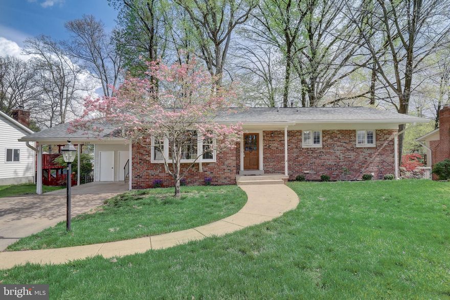 OFFER DEADLINE MONDAY 4/22 @ NOON***   Classic 4 bedroom/3 bath brick rambler in sought after Mosby Woods!  This home features hardwood floors and carpeting on the main level, a partially renovated kitchen w/ granite counters and newer appliances plus a gorgeous brick wall feature in the dining area.  There's a large living room that overlooks the private, fenced rear yard, along with 3 large bedrooms and 2 partially renovated full bathrooms.  The finished walk out lower level features a family room w/ fireplace (flu insert just replaced), stylish LVP flooring, a 4th bedroom, a 3rd full bath and lots of additional space for storage!  Updates to this charming home include a New roof/gutters, HVAC system, newer water heater, and select appliances.  Seller prefers to settle after June 1 and prefers Ratified Title!