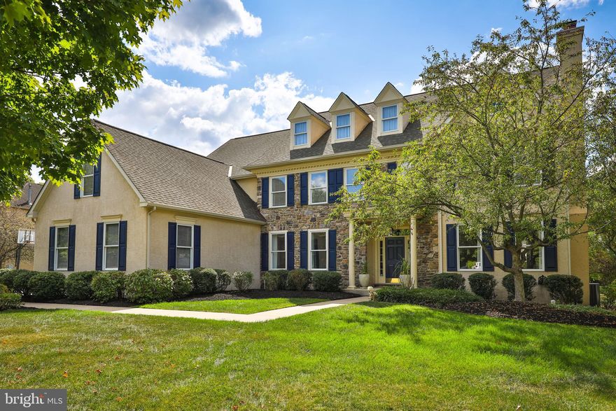 Just listed in Lower Gwynedd Township! Located in the sought-after Spring House Farm neighborhood, this Guidi-built Colonial Farmhouse offers over 6,000 square feet of living space, including a partially finished basement with a full bathroom and ample unfinished space for a future home gym, wine cellar, or private movie theater. The home’s prime location provides easy access to the YMCA and nearby walking trails, making it ideal for those who enjoy an active lifestyle and the natural beauty Lower Gwynedd offers.
Designed with flexibility in mind, the home features a main-level suite perfect for multi-generational living or an au-pair arrangement. Step inside to a gracious two-story foyer with high ceilings and newly refinished hardwood flooring. Two gas fireplaces—one in the Family Room and another in the Living Room—add warmth and charm to the interior spaces. The expansive kitchen includes a breakfast area, a large walk-in pantry, and a Butler’s Pantry, making it a dream for entertainers. Flow seamlessly into the elegant formal Dining Room or gather in the spacious Family Room, which features vaulted ceilings and custom built-ins. A home office on the first floor, complete with glass-paneled doors, offers a private workspace. Upstairs, the primary suite boasts an enormous walk-in closet and an en-suite bathroom with a stall shower, jetted tub, and dual vanities. Four additional bedrooms are thoughtfully arranged, with two sets of Jack-and-Jill bathrooms. A bonus room off one bedroom provides even more flexibility, perfect for use as a playroom, home office, or extra storage space.  Outside, the maintenance-free deck and patio provide the perfect backdrop for creating your own backyard oasis, while the three-car garage offers ample storage. The home is equipped with a  built-in house generator for peace of mind and an irrigation system to keep the grounds lush and beautiful. A three-car garage provides ample storage. Located in the top-rated Wissahickon School District, with easy access to the Springhouse Shopping Center, major highways, and commuter rail options, this home offers the perfect blend of convenience, lifestyle, and luxury.  Call today to schedule your private tour!