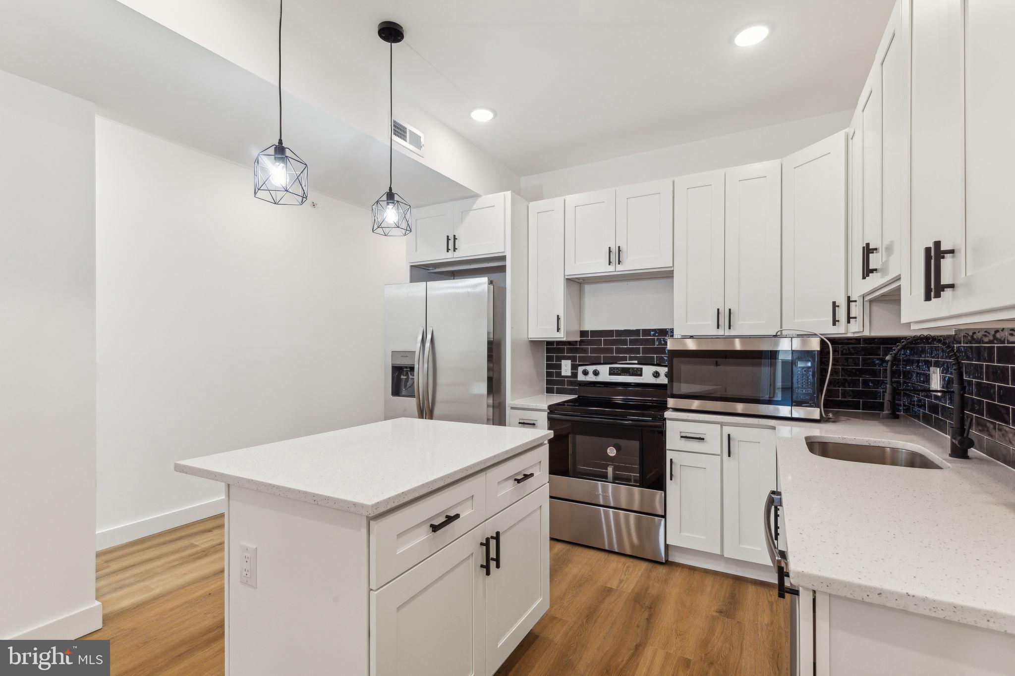 Welcome to this brand new construction home! This unit features hardwood flooring, state-of-the-art kitchen complete with steel appliances, flawless quartz countertops and an island with ample cabinetry. Unit 3 has 2 spacious bedrooms and 2 full bathrooms complete with in-unit laundry for convenience and your own PRIVATE roof deck! Schedule your tour today!
Tenants are responsible for the following utilities:
Water $50/mo flat fee (subject to change depending on the number of tenants)
Electric (based on usage)
NO GAS
Internet
Text the listing agent for a video tour!