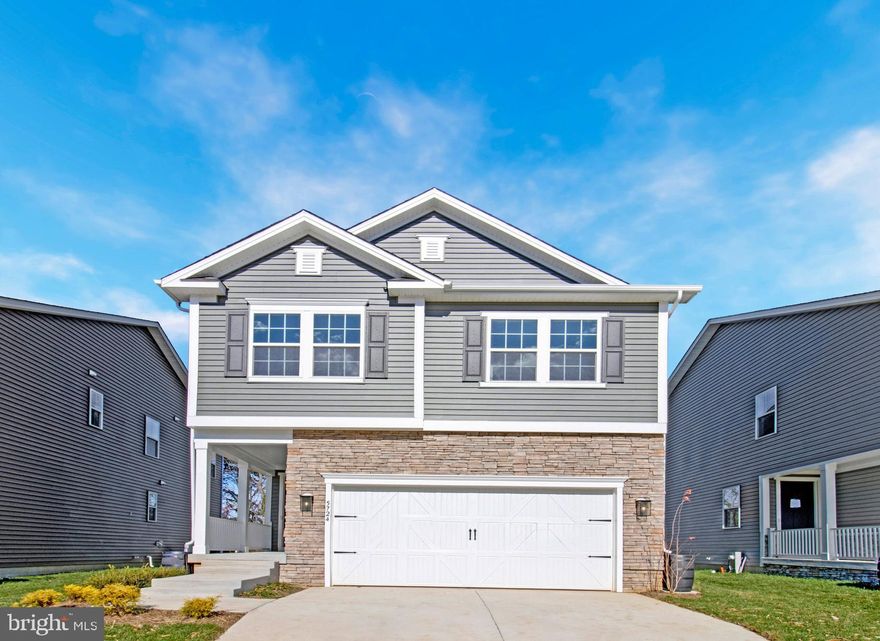 WITH RATES BELOW 5% YOU CAN OWN THIS BRAND-NEW MOVE IN READY HOME FOR THE SAME PRINCIPAL & INTEREST PAYMENT AS A $525,000 RESALE! This 4-bedroom, 3 1/2 bath Lynette by Richmond American Homes. The main floor of this charming Lynette plan offers an inviting great room with an electric fireplace with mantel boasting a stunning floor to ceiling tile, Mohawk luxury vinyl plank floors on the main level, 9' ceilings with 8' doors, a powder room, and a gourmet kitchen with a convenient island, quartz countertops, backsplash, pantry with wood shelves.  Beautiful Oak Stairs take you to the top floor, you’ll find four elegant bedrooms, including an impressive primary suite showcasing a roomy walk-in closet and a deluxe bath with double sinks. A secondary bath, top floor laundry room, 2-garage with EV charging station, video doorbell, smart locks, smart thermostat for energy efficiency, nice wide sidewalks throughout the community, and last but not least a completely finished basement with 9' ceilings, rough-in for wet bar & a full bathroom complete this home. Enclave at Arundel Hills is an exciting new community in Glen Burnie. It offers easy access to major employers in Baltimore, Annapolis, and Washington D.C. via I-695 and I-97 and is located just minutes from Fort Meade. Residents can also appreciate close proximity to BWI, countless dining options and minutes to waterfront restaurants, and entertainment options. Choose from an attractive array of single-family homes, each boasting the designer details and in-demand features today’s homebuyers are seeking! Model is OPEN but visitors are encouraged to call ahead to be guaranteed a dedicated appointment.