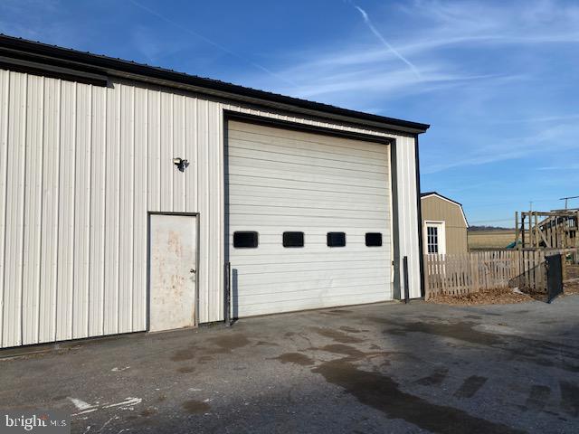 24x40' shop with 12' overhead door. Also included is a 360 sq. ft. office space.