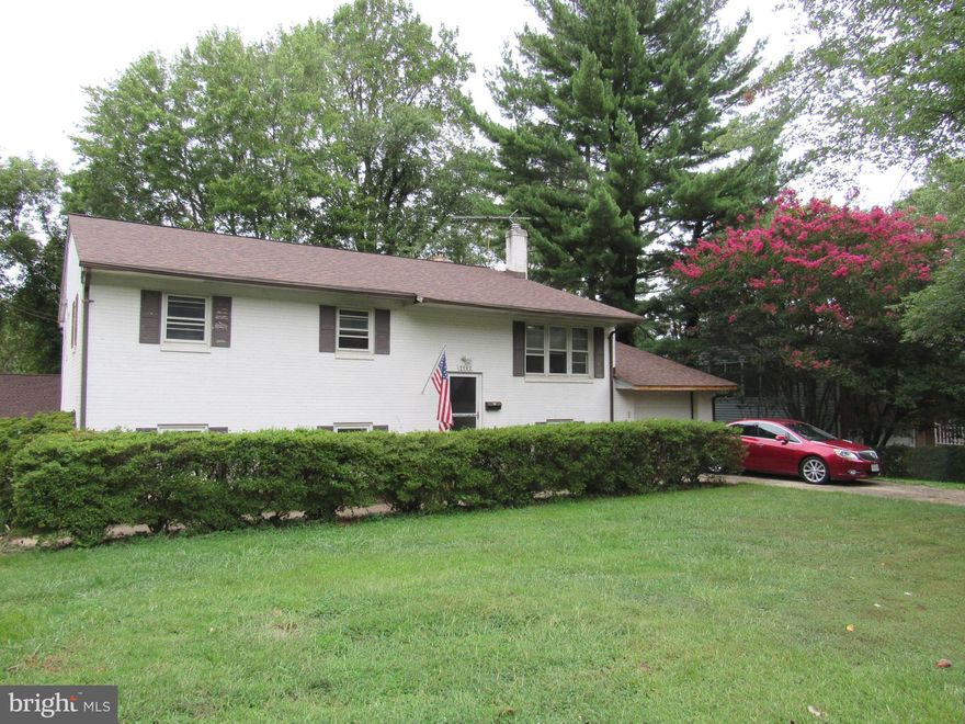 HUGE PRICE DROP and priced more than $70K below assessment t>This home is LARGE and has been expanded>Incredible potential for someone that is willing to update/renovate and have a large home to build instant equity>This fixer upper has good bones, but truly a great investment opportunity to renovate/refurbish or build new in area of high-level homes>Sold in As-Is condition>Most systems work, but repairs/updates needed>Value is in the size of home and location>The existing 2-level layout features 6 BR s, 2BA + 2 half baths>Featuring a HUGE great room w/high vaulted ceilings, an eat-in kitchen w/big center island & cherry cabinets, adjoining family room w/fireplace, half bath and walk out to upper patio>Owner's suite with a walk-in closet and double-size bath>Separate dining room, hardwood floors, 2 fireplaces, a finished lower level with 5 bedrooms>Multi-zone heating & central A/C>Brand NEW roof>Oversized 2 car detached garage w/new trusses/roof + separate attached garage are ideal for a car collectors, mechanics or contractors>Located in the desirable and sought after McLean High School pyramid>Less than 1 mile from the West Falls Church metro and Orange/Silver Line Metros, Tyson s 10 min, I-495/66  & 20 min to DC, and easy access to commuter routes>Near recreation, shopping, groceries, dining, and so much more>Owners in process of moving out so please excuse boxes/personal items.