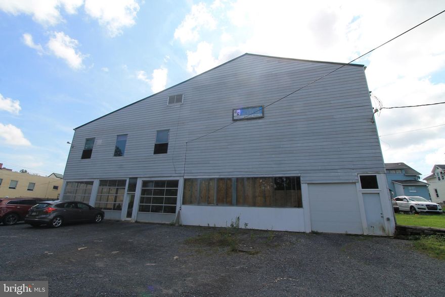 This commercial building with 2,000 square feet offers office, warehouse and garage space for all your needs. The space includes 5 offices, a conference room and a kitchen while the main building offers 3 garage stalls. Rent is $2000/mo., tenant is also responsible for electric, gas and snow removal.