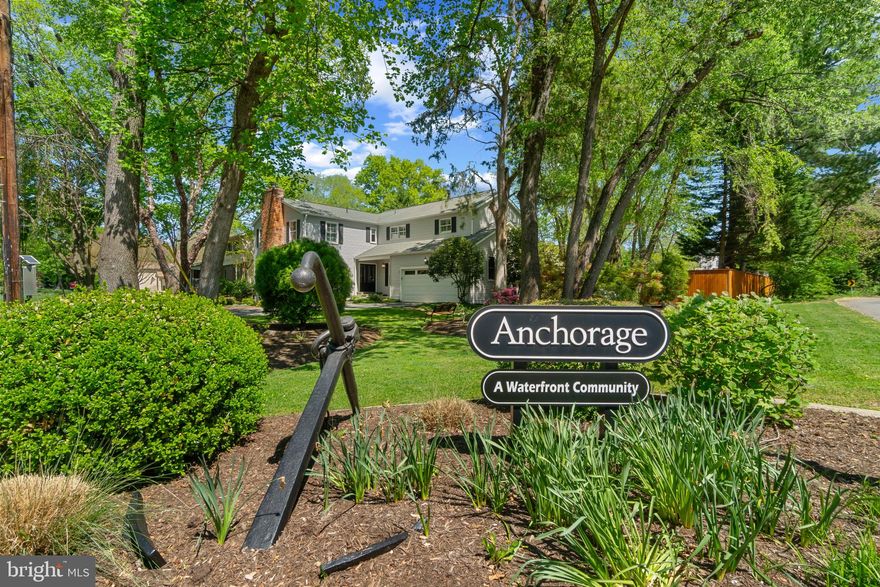 Welcome to 3143 Anchorage Drive in Annapolis, Maryland!  This stunning, contemporary colonial home is in the waterfront community of Anchorage which amenities include a marina and a pool!  Located on a ½ acre corner lot, this colonial features 5-spacious bedrooms and 3.5-bathrooms, including both an owner’s and junior suite bedrooms.  The property includes a double garage, an extensive fully fenced backyard and a patio offering plenty of outdoor space for gardening, play, or entertaining.  The interior, spanning over 4,000 square feet, has an open layout floor plan with hardwood floors on both main and upper levels.  The heart of the home is the chef’s kitchen, with high-end performance appliances,  custom cabinetry for ample storage, expansive granite countertops and a breakfast bar.  Truly a dream kitchen for a professional chef or avid home cook!  The great room features a stone hearth fireplace, vaulted ceilings with skylights, built-ins and direct access to a welcoming screened-in porch.  With four fireplaces in total, there’s plenty of warmth and ambiance throughout this exquisite home.  The owner’s suite has also vaulted ceilings, elegant wall-to-wall built-in, gas stove, large walk-in closet, and en-suite spa-like bathroom with a luxurious double vanity, granite countertops, jetted tub, heated marble tile and laundry chute.  Don’t miss the opportunity to make this wonderful house your new home in the sought-after water community of Anchorage and minutes away from downtown Annapolis!