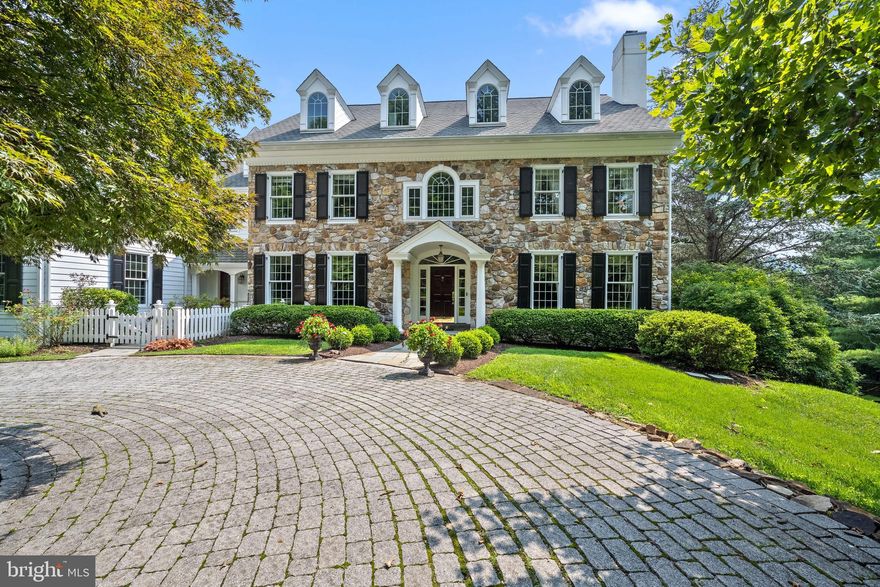 Prepare to be IMPRESSED! Introducing 4 Iddings Lane in the highly desirable community of Harrison Estate and within Top Rated Marple Newtown School District. Situated at the end of a beautiful cul-de-sac on a 1.5 acre lot backing to the Brandywine Conservancy and walking trails, this 5 bed, 5.3 bath home exudes curb appeal from the second you approach the Belgian block circular driveway. Architectural details and interior finishes such as the mahogany-stained front door, cherry hardwood floors, custom millwork, crown molding, recessed lighting, deep windowsills, transom and oversized windows, and wide arched doorways are all sure to impress! This center hall colonial offers a welcoming entry foyer with grand staircase, solid brass chandelier, and beautiful straight-through views of the gorgeous rear yard. To the right is the formal living room with gas fireplace and mantel, and double doors that open to the spacious professional office. Across the foyer, the expansive dining room comfortably seats 10+ people and connects to the butler’s pantry with sink, cabinet storage, ice maker, and wine fridge- flowing directly into the kitchen. Truly the heart of the home, the kitchen boasts a massive 10ft. center island with quartz countertop and prep sink, custom cabinetry, corian countertops, porcelain tile backsplash, commercial grade built-in appliances, large walk-in pantry, “kitchen command” station, and adjacent breakfast room with french doors opening to a covered porch and pergola area. The show-stopping family room offers coffered tray ceiling, cozy window seat, gas fireplace, and wide wall of built-ins,  flowing effortlessly from the kitchen- making this home perfect for entertaining! Finish your day in the relaxing sunroom with a ceiling fan and walls of windows - enjoy beautiful views of the yard and multiple terraces. This floor is completed with 2 powder rooms and a mudroom with rear staircase, storage, access to garage, and a separate entrance. The second level offers an exceptional primary suite with a grand double door entrance, tray ceiling, and an expansive dressing room with built-in dresser area, his/her walk-in closets, and a linen closet. Walk through the dressing room to the luxurious marble-tiled primary bathroom featuring dual vanities, corner jacuzzi tub, oversized frameless glass shower, and private toilet. Beyond the overlook area on the second floor landing, follow the hall to four more spacious bedrooms – (one of these bedrooms has sliding doors to a private deck overlooking the rear yard) two with ensuite bathrooms and two that share a Jack & Jill bathroom; large laundry  with sink and cabinetry; a spacious walk-in cedar closet, and staircase to the third level of this gracious home. The possibilities are endless for this upper level with ceiling fan, built-ins, and half bath – perfect as a second home office, relaxation or art studio, or an addt'l bedroom! The lower walk-out level is simply spectacular, offering a  beautiful cherry bar with seating for 6, custom cabinetry, sink, fridge, dishwasher, and microwave; game and family room area; full bath with shower; and  fabulous theater room with equipment, theater seats, and built-ins. There is also a workout room, and huge unfinished storage area. The exterior of the home is not to be missed  -  covered porch and pergola area that overlooks the private yard and several levels of flagstone terraces/patios. Just a few steps down, you’ll find a wonderful place to relax by the hot tub and the pool – surrounded by mature landscaping and lawn, and backing to the Brandywine Conservancy. Featuring a spacious 4-car garage, plenty of parking, 6 zones for heating and cooling, generator, security system with cameras, sound system, public water, natural gas, onsite septic system. All of this while being close to Episcopal Academy, Academy of Notre Dame, and the Agnes Irwin School; minutes to Downtown Wayne and Paoli Train Station  and major roadways!