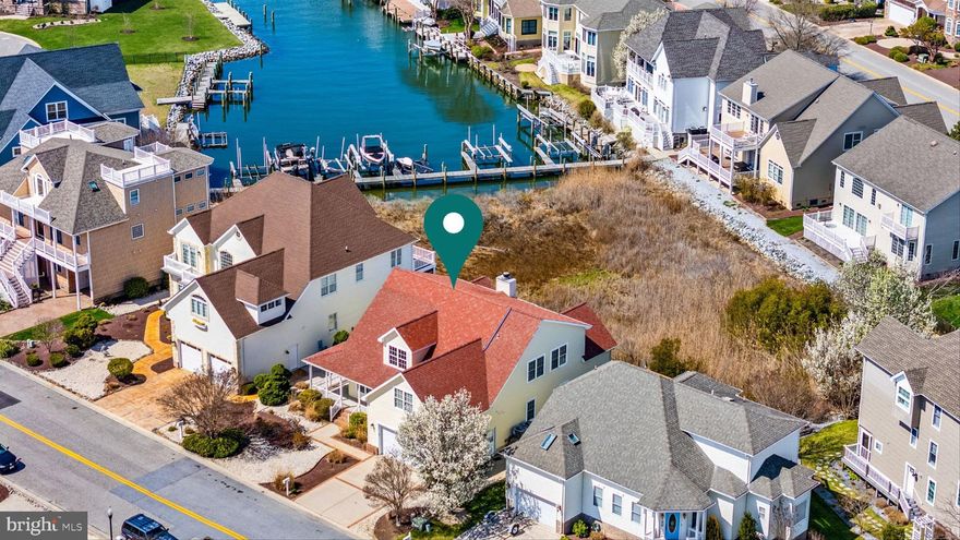 Waterfront Access. Refined Living. Prime North Ocean City Location.

Welcome to 304 S Heron Gull Court, a custom-built home in one of Ocean City’s most desirable bayside communities. With deeded boat access, open bay proximity, and a layout built for both full-time living and coastal escapes, this property checks every box — and the seller is ready to move.
Flexible Layout & Quality Craftsmanship.
Thoughtfully designed with over 3,000 square feet of living space, the home features:
4 large bedrooms plus a dedicated home office.
Bonus room perfect as a 5th bedroom, gym, or media room.
Two-story living area with a floor-to-ceiling stone fireplace.
Open kitchen and dining area with water views.
Screened-in back porch and wraparound front porch for year-round enjoyment.
Natural light, hardwood flooring, custom finishes, and spacious closets elevate the everyday experience. A two-car garage and well-appointed baths complete the interior.
- Your Boat. Your Backyard -
With a deeded boat slip a short walk from behind the home, you're minutes from the open bay — ready for a morning paddle, afternoon cruise, or dinner by water. Few properties offer this level of access and privacy in a location so close to it all.
Community Amenities That Deliver!
Located in Heron Harbour Isle, residents enjoy:
- Olympic-size outdoor pool
- Heated indoor pool
- Kiddie pool
- Tennis courts
- Fitness center and sauna.
All within a quiet, well-maintained neighborhood designed for easy coastal living.

North Ocean City at Your Fingertips!
304 S Heron Gull Court isn’t just a home — it’s your gateway to a better way of living on the water.
Located on 120th Street in North Ocean City, you’re tucked away from the crowds but still just minutes from the beach and some of the area's most beloved restaurants, shops, and attractions. Enjoy a casual dinner at The Original Greene Turtle, pick up fresh local produce at Nearby Farmers Markets, or explore Northside Park, Ocean City’s largest and most vibrant public recreation area — home to fireworks shows, holiday events, walking trails, sports fields, and more.
You’re also just a short drive from Gold Coast Mall, Fenwick Island, The Original Crabcake Factory, Mini-Golf, a Movie Theater, and popular entertainment spots like Harpoon Hanna’s, Fager’s Island, and Seacrets.

Whether you’re seeking a forever home or a relaxing second-home at the beach, 304 S Heron Gull Court delivers the ideal blend of elegance, comfort, and coastal convenience. This is the lifestyle you've been dreaming of — and it's the best priced home in the community.