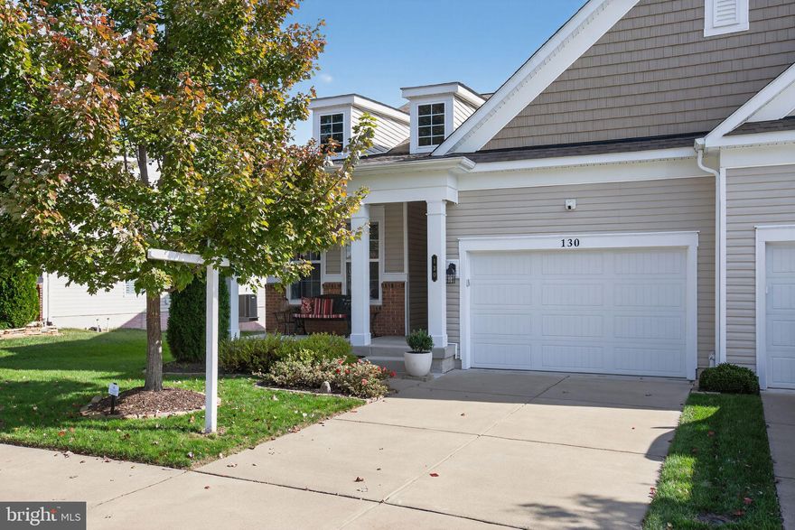 Welcome to 130 Long Point Drive, an exceptional home in the sought-after 55+ community of Celebrate Virginia North!  This beautifully maintained residence combines modern upgrades, open-concept living, and the comfort of a thoughtfully designed layout with more than 3,000 square feet of finished space. Built in 2018, the home features three spacious bedrooms, three full baths, and a finished walk-out lower level, offering the perfect balance of everyday convenience and entertaining flexibility.

The main level welcomes you with a bright, open floor plan, where the great room centers around a cozy fireplace with built-in HDMI and electrical access for your TV. The adjoining gourmet kitchen boasts quartz countertops, stainless steel appliances, double wall ovens, and custom LED lighting above and below the cabinets. The dining area flows effortlessly onto a maintenance-free upper deck overlooking a private backyard and covered patio below—ideal for morning coffee or evening relaxation. The owner’s suite offers new plush carpet (2024), a professionally upgraded closet system, and a luxurious bath. A second bedroom and full bath on the main level provide comfort for guests or a flexible office space.  There is also a fabulous flex space for your home office or den space, just off the kitchen on the main level.

The finished lower level extends your living area with luxury vinyl plank flooring, a large recreation room, full bath, and generous storage. The outdoor living spaces are exceptional, featuring an under-deck ceiling system that keeps the patio dry year-round and a beautifully maintained landscape enhanced by gutter guards. Additional highlights include a whole-house generator with a 10-year transferable warranty (installed 2022), a water softener system with 10-year warranty, a radon mitigation system, smart programmable thermostat, surge protector, ceiling fans in all bedrooms and the living room, and front and rear storm doors.

Celebrate Virginia North offers resort-style amenities including a grand clubhouse, indoor and outdoor pools, tennis and pickleball courts, fitness center, trails, and vibrant social activities—all with lawn care and exterior maintenance included in the $316 monthly HOA. Experience refined, low-maintenance living at its best—just minutes from shopping, dining, and medical services in Fredericksburg.