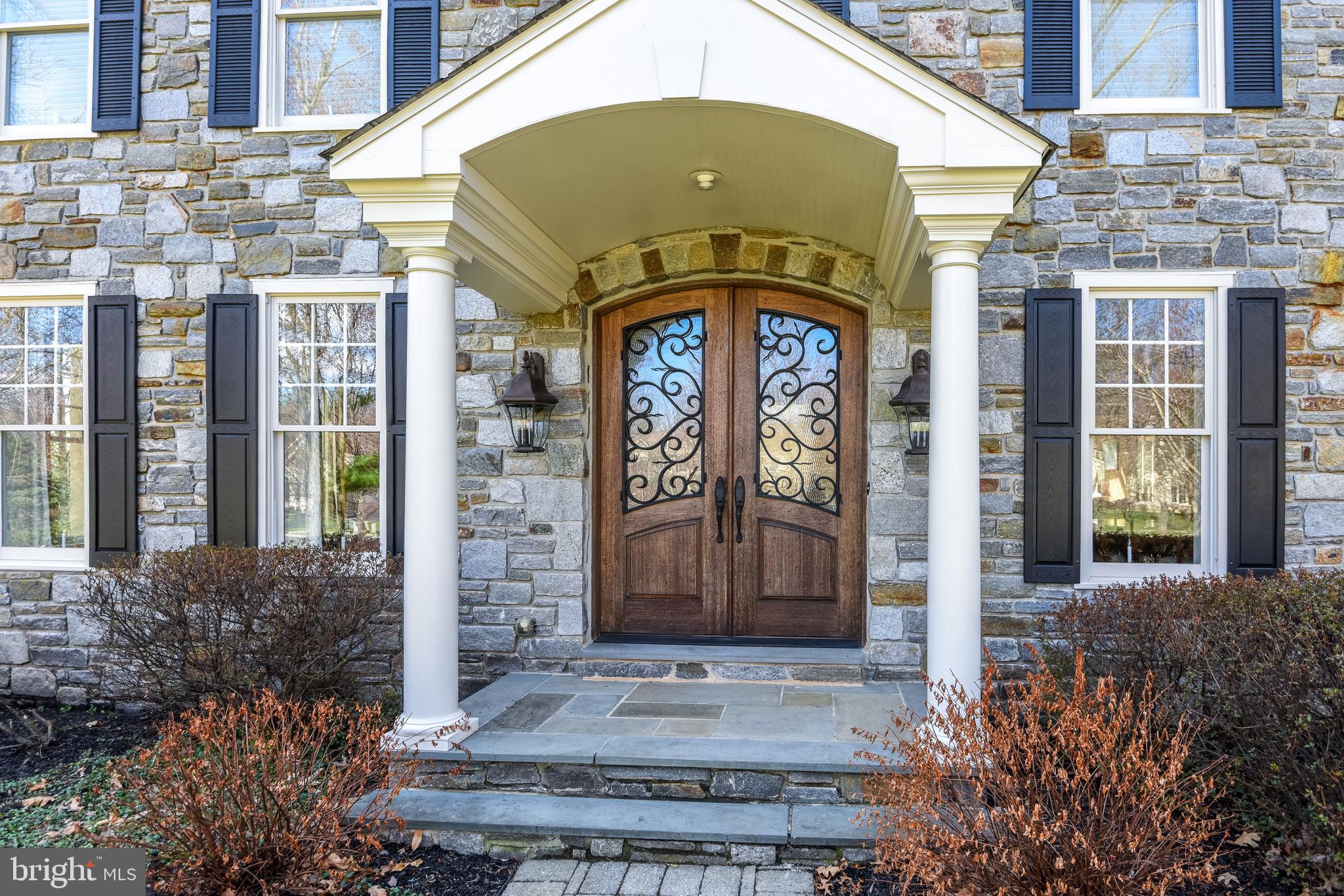 Situated in Lower Gwynedd Township is a premier enclave of one of a kind Estate Homes called Parsons Glen. Rarely offered is this 5-bedroom, 5.2 bath Farmhouse Style Estate Home featuring Stone & Hardie plank facade. Featuring over 7500 square feet of living space, this unique home not only offers much space, but the warmth of a southern style Estate home with an abundance of upgrades and new finishes. Approaching this home, you are welcomed by a new covered porch featuring a new double southern style custom front door. You are welcomed into a grand sized foyer and refinished hardwood floors which flank the entire first floor, including the main stairs and railings. A formal Living Room features a wood burning fireplace with the option to convert to gas. A gracefully designed formal Dining Room with a tray ceiling and newly finished wainscoting creates an elegant style for entertaining. Today's lifestyle fits this home perfectly with the open style first floor yet provides privacy for the work from home which this main floor offers. The 1st floor study features glass French doors, built ins, spaciousness, and privacy. The back foyer leads to a 2-story family room with a wood burning fireplace (convertibility to gas), a grand gourmet kitchen with a spacious breakfast room, a newly renovated mud room with custom lockers, drawers & corner cabinet 2 powder rooms, a main staircase leading to finished basement & 2nd floor, a back staircase leading to finished basement, 2nd floor and finished attic with 5 bedroom & bath for a possible au pair suite or in-law suite! Updated kitchen amenities include a commercial 6 burner gas range, built in refrigerator, 2 ovens microwave & dishwasher. More special features of this home include all replaced interior doors and hardware, new water heater, 2nd floor laundry room, completely renovated owner’s bath with radiant heated flooring, newer 2nd floor AC unit, new heater & AC on 3rd floor, 3 Wi-Fi thermostats, new 2nd floor carpeting, freshly painted, updated irrigation system, gutter guards, new windows in most of the home, new Hardie plank siding (2020), pre-wired for cat 5, new basement carpeting, 2 electric 220 amp panels, recessed lighting and closet organizers and custom wood trims throughout. An amazing setting with luxurious amenities, outstanding Wissahickon School District, easy accessibility to parks, shopping, restaurants, center city Philadelphia, 476, 309, turnpike, 95 and rail system make this Luxury Estate Home even more of a prize for you! Make your private appointment today.