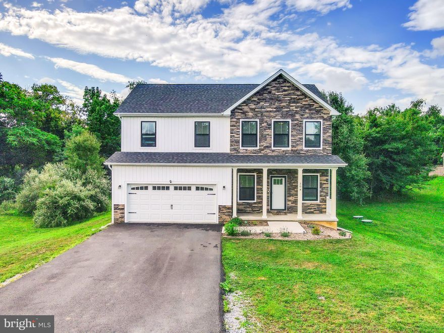 Welcome to your dream home in Charles Town, WV! This exquisite single-family residence sits gracefully on a little over an acre of pristine land, offering you the perfect blend of space, comfort, and modern luxury.
With 4 spacious bedrooms and 2.5 bathrooms, this home boasts a thoughtful design that caters to both relaxation and functionality. The convenient upstairs laundry room adds a touch of convenience to your daily routine, while the stunning Luxury Vinyl Plank (LVP) flooring on the main level exudes elegance and durability, setting the tone for the entire home.
Step into the heart of the home, where a kitchen adorned with granite countertops and stainless steel farm sink and appliances awaits your culinary creations. This haven of culinary inspiration seamlessly connects to the dining area, creating an ideal space for gatherings and entertaining friends.
The primary bedroom suite is a true retreat, featuring a generously sized walk-in closet and an ensuite bathroom that encompasses luxury and relaxation. Immerse yourself in the ultimate relaxation experience with a separate shower and tub, promising moments of serenity after a long day.
The full walk-up basement, complete with rough-in plumbing, offers endless possibilities for customization to fit your lifestyle and needs. Whether you envision a cozy entertainment area, a home gym, or a creative workspace, this space is a blank canvas awaiting your personal touch.
Gorgeous wainscoting graces the main level, adding an extra layer of sophistication and charm. The property, only 2 years old, is move-in ready, sparing you the hassle of renovations. With a 2-car insulated garage, you'll have ample storage space for your vehicles and belongings.
As you step outside, the rear garden beds and shed offer an oasis of natural beauty, perfect for gardening enthusiasts or anyone who appreciates outdoor tranquility.
Embrace the serenity of suburban living while being conveniently located to amenities, schools, and major routes. Don't miss out on the opportunity to call this meticulously maintained property your new home. Schedule a viewing today and make your dreams a reality in this Charles Town gem!