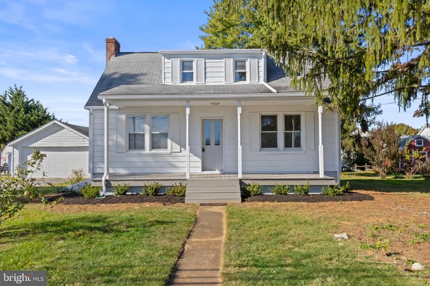 Well maintained home only 15 minutes from Downtown Frederick. This home has been freshly painted and it boasts wood floors throughout, lots of natural light, three spacious bedrooms and an oversized 4-car garage with plenty of space for storage and its own workshop, a large rear deck with direct access to the main living area and a charming large front porch. Live in while completing updates and build great equity! The spacious basement has potential to finish for additional living area.  Ideally located near Valley Elementary School and popular local spots like Hemps Meats!