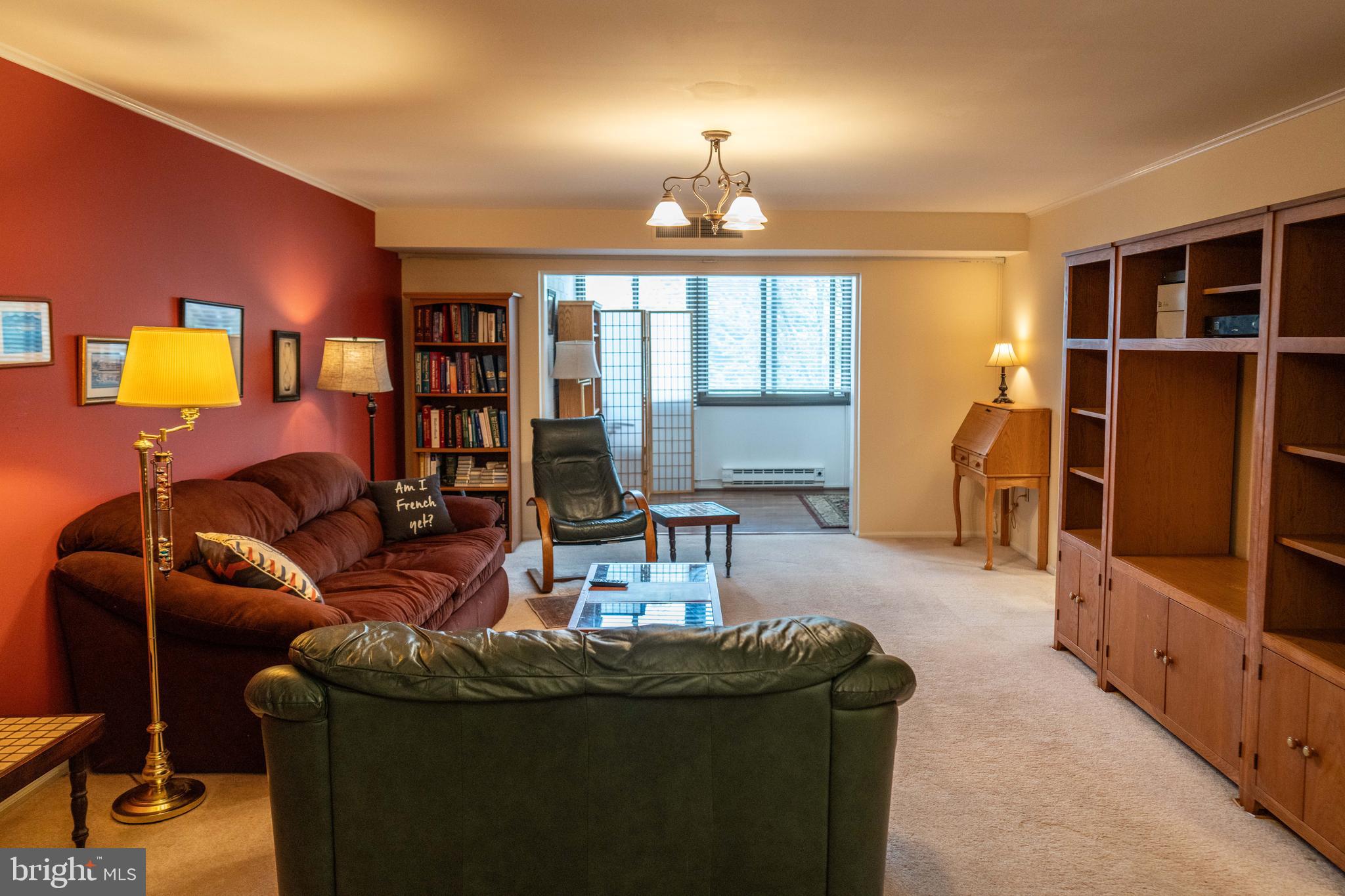 Opportunity knocks.....A fabulous unit is available at Benson House. Make your appointment today!
Entering the building, you'll find a beautiful lobby leading to the elevators or steps to your unit. Just inside your front door, you have a convenient coat closet. Step into the large Living/Dining Room and you'll immediately note the bright, natural light flooding the room. This lovely space is open to the Kitchen and also the wonderful Sunroom with an entire wall of windows. The utility closet is tucked back in the corner. The Sunroom also leads into the galley-style Kitchen with lots of cabinets, updated appliances, and a laundry closet with a stack washer/dryer. The hallway leads to the Bedrooms. The Primary Bedroom, at the end of the hall, is quite spacious, has a huge walk-in closet, and a nicely tiled Bathroom with double-bowl vanity and a stall shower. The second Bedroom is also very nicely sized, & has a large closet, with the second full Bath right across the hall. There's lots of storage in the unit, and additionally, a large storage locker in the basement is available. Benson House is meticulously kept and offers a secure entrance. There is also a community library in the building, as well as a game room and an exercise/yoga room. All of this, and a location that can't be beat....within a short walk to the train, lots of local shops & restaurants, the beautifully refreshed Ludington Library, and so much more! I'm sorry, NO PETS are allowed.