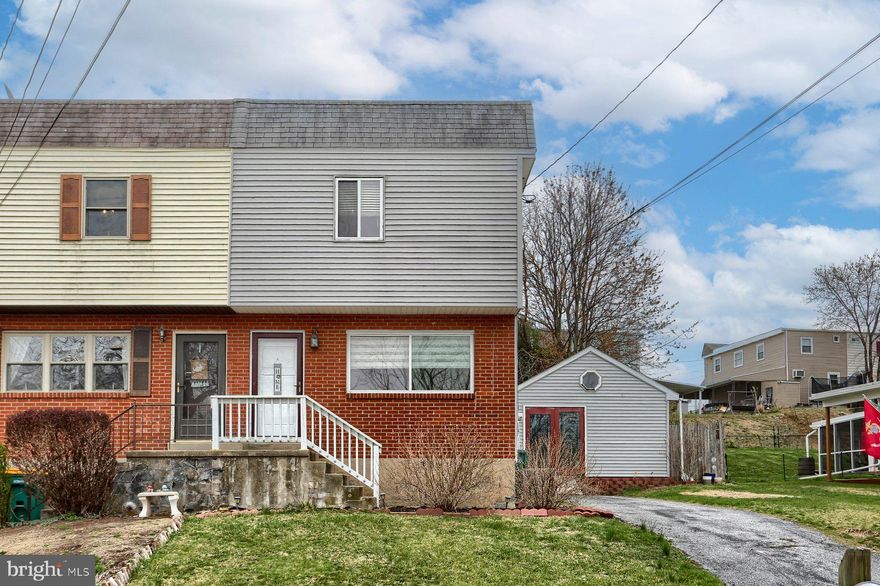 Great starter home! We're pleased to offer this remodeled townhome. The home features a large living//dining room with hardwood flooring, a beautifully remodeled kitchen with stainless steel appliances,  one and a half updated baths, three bedrooms and a lower level rec room. Lots of extras including a newer roof, vinyl siding  replacement windows, economical gas heat with CENTRAL AIR, a big shed for storage, crafts or gardening and a fenced rear yard.