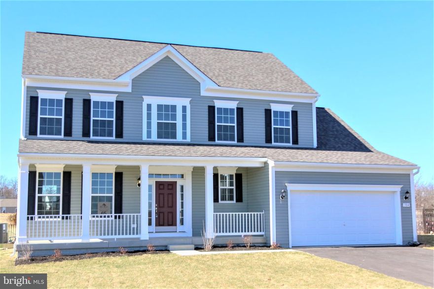 Fall Delivery! Welcome home 4BR, 2.5 BA, 2 car garage w/front porch,entire 1st floor hardwood in Oceanside gray, iced white quartz counters, island &  s.s. appliances,walk in master closet, tray ceiling in master, master bath w/large shower w/seat &  upgraded tile floors & walls. Upstairs laundry.  Unfinished walk up basement w/ 3 pc.for future expansion