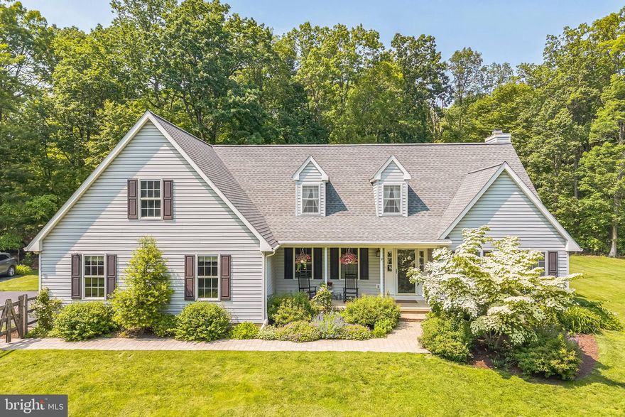 Discover the perfect blend of privacy and convenience with this custom-built Cape Cod located on a stunning 2-acre level homesite in the heart of Chester County. Backing onto 65 acres of the serene Hibernia Park Woodlands, this home offers a rare opportunity for those seeking tranquility and connection with nature while only a short drive from the amenities of West Chester.
Inside, the home reveals an expansive and thoughtfully designed layout. With four bedrooms and two and a half baths, it's designed for comfortable family living and entertaining. The first-floor primary suite is a standout feature, providing a peaceful retreat that includes a walk-in closet and private French door access to the deck. The luxurious primary bath, remodeled in 2016, features heated flooring, a modern glass shower, and a double vanity.
The heart of the home is a bright, open kitchen equipped with sleek Frigidaire Gallery Series stainless steel appliances, including a refrigerator, dishwasher, wall oven, and microwave. Enjoy meals in the dining area with its picturesque view of the expansive yard, or gather in the family room, which opens to a multi-tiered deck. French doors lead you out to this fantastic outdoor space complete with a relaxing hot tub, ideal for unwinding after a long day.
The first floor also includes a versatile room that can serve as a fourth bedroom or a home office, catering to today’s flexible living demands. Recent updates include a remodeled powder room and a convenient laundry/mudroom. Both the family room and dining room feature newly replaced windows that bring in abundant natural light, enhancing the home’s warm and inviting ambiance.
Upstairs, two generously sized bedrooms share a full hall bath. The second floor also offers a large walk-in attic space, perfect for storage or potential future expansion, along with a smaller secondary attic.
Completing the home is a full, unfinished basement offering endless possibilities—from additional storage to future recreational or workshop space. The oversized two-car garage provides interior access, an electric opener, and ample room for storage.
Outside, the level, fenced-in yard is a private oasis, offering space for pets, gardening, or simply enjoying the great outdoors. A spacious storage shed is perfect for lawn equipment and outdoor toys. The circular driveway offers ample parking, including space to accommodate an RV, making it ideal for visitors or adventures on the road.
The home's location is truly a highlight, set amid the natural beauty of Chester County and the recreational opportunities offered by the adjacent 65 acres of Hibernia Park Woodlands. Whether you're hosting summer barbecues or relishing quiet evenings under the stars, this home provides endless opportunities to create lasting memories. Take a look then take action!